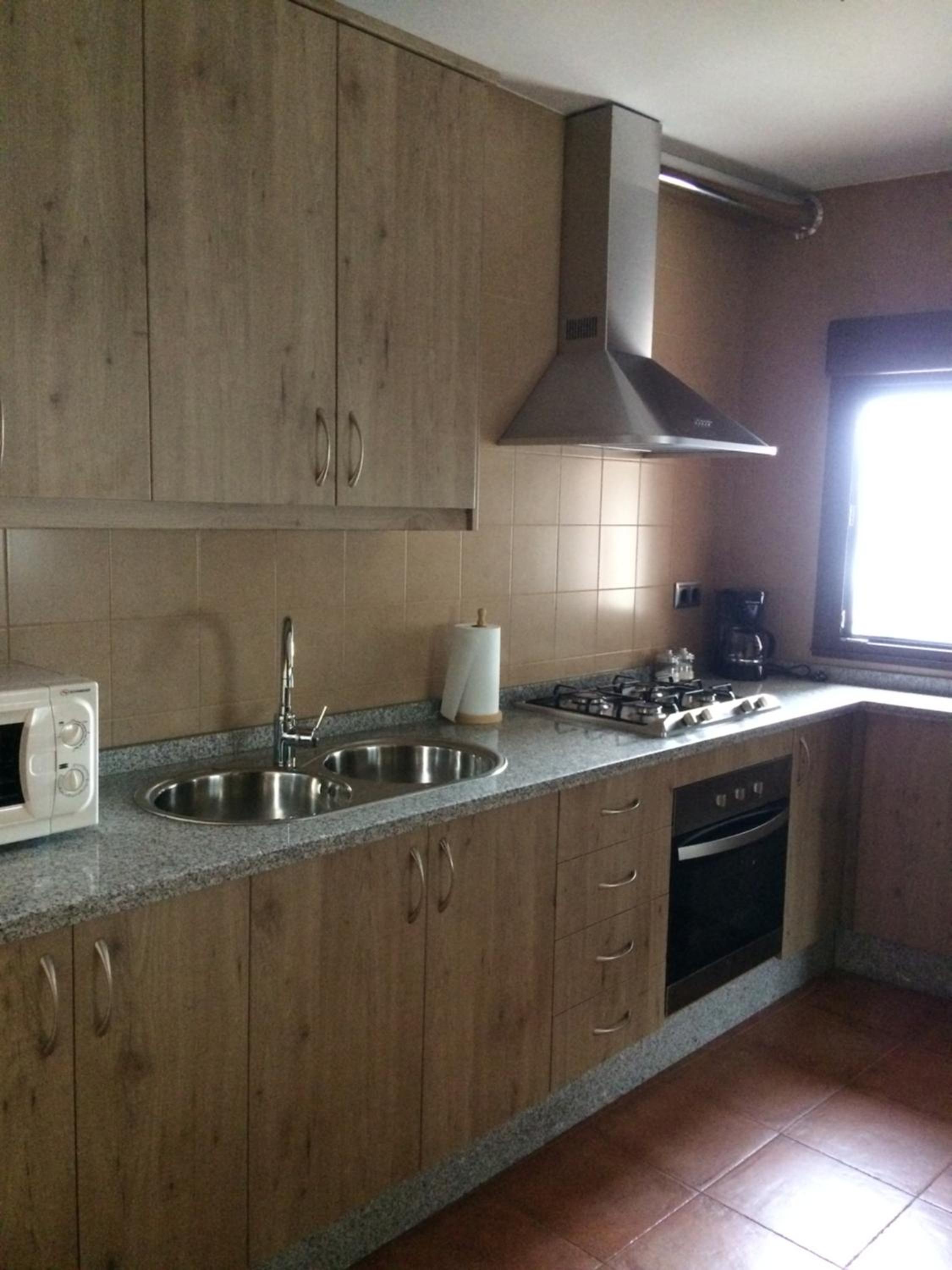 Three-Bedroom House - Photo 10