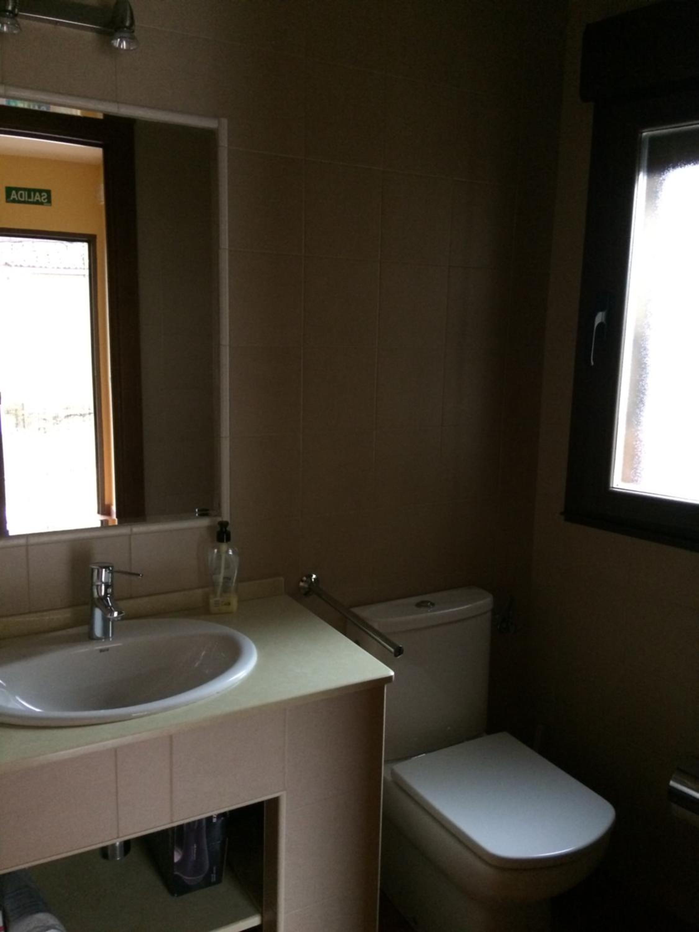 Three-Bedroom House - Photo 7
