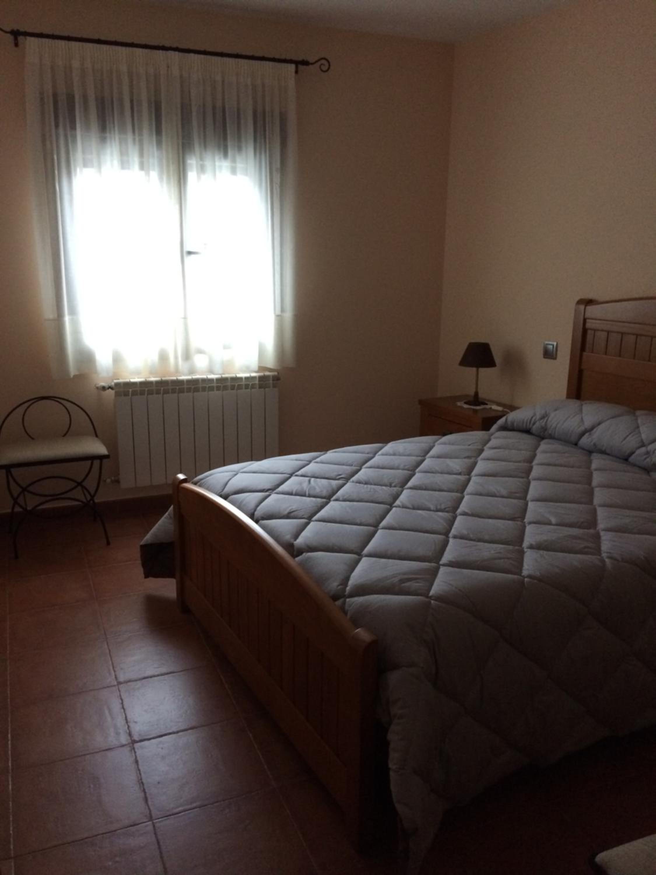 Three-Bedroom House - Photo 17