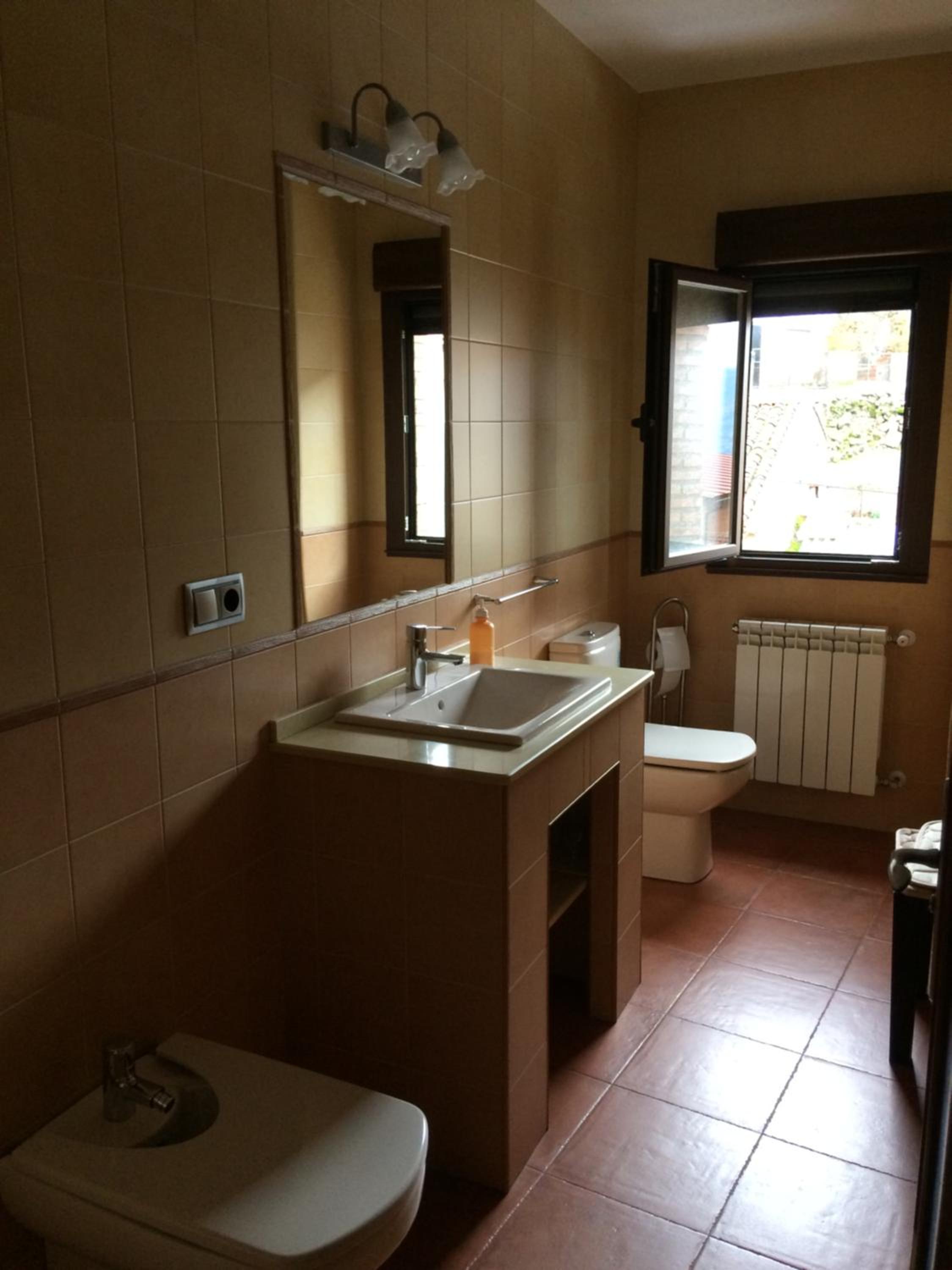 Three-Bedroom House - Photo 24