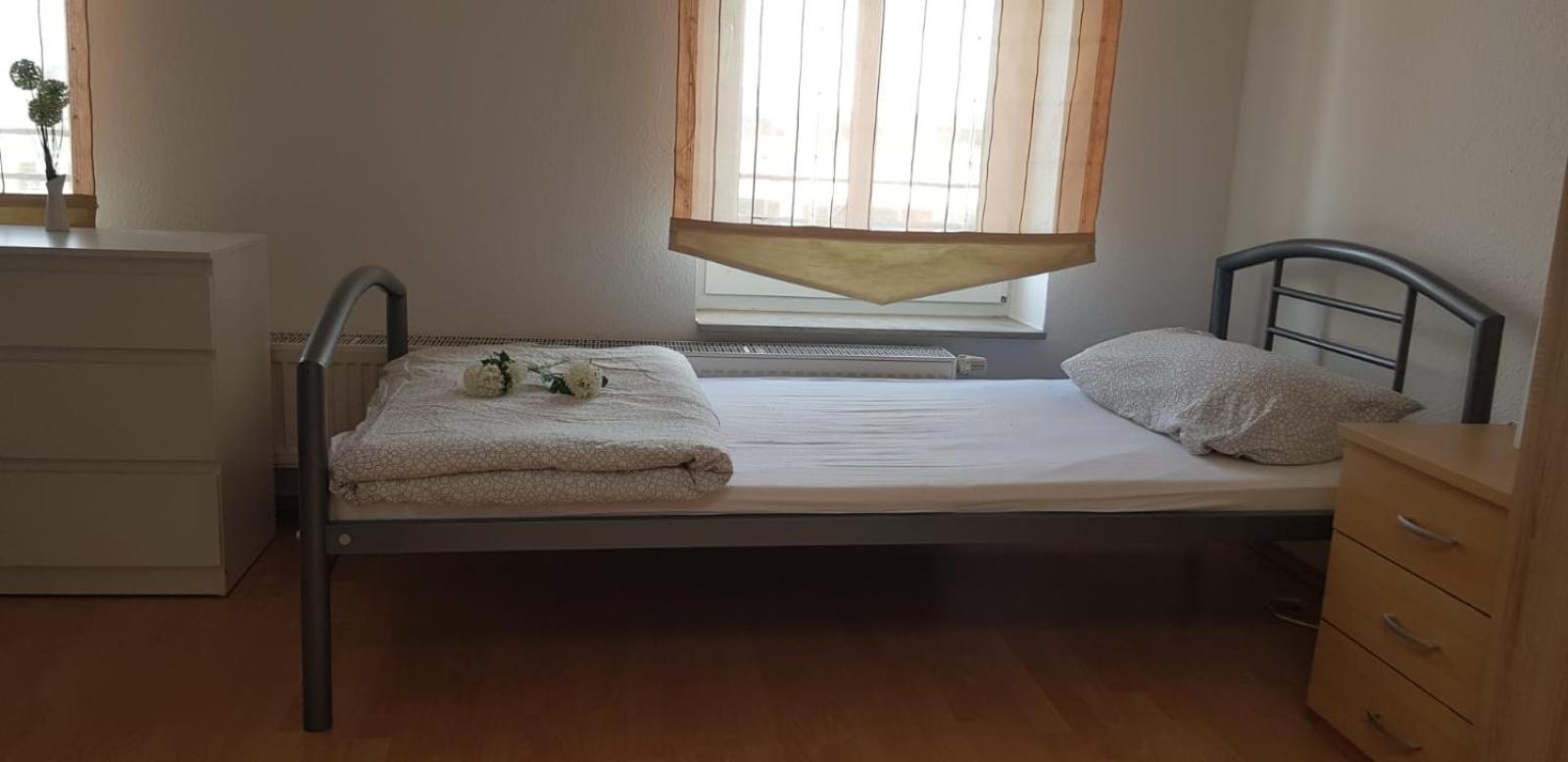 Three-Bedroom Apartment - Photo 1