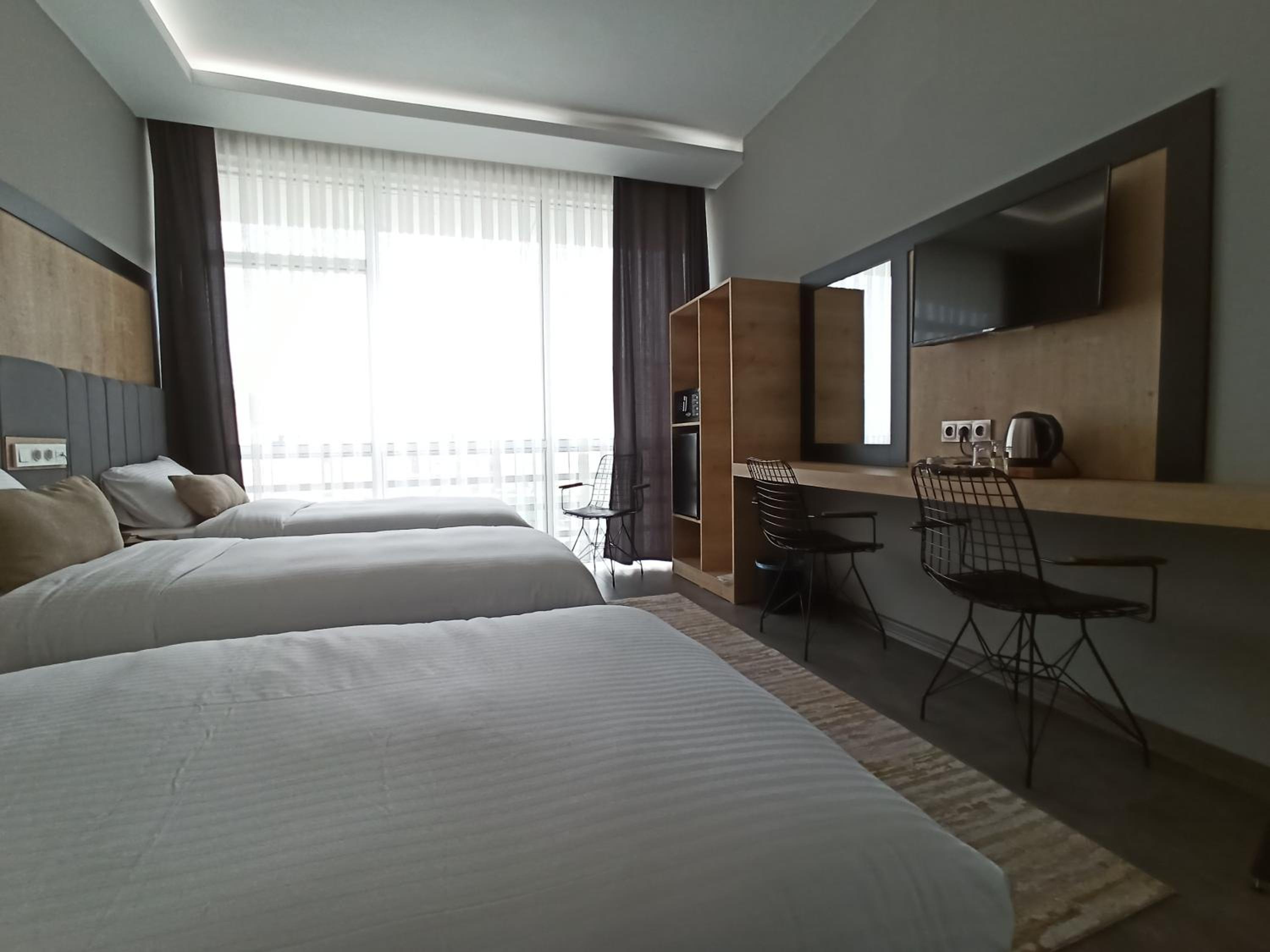 Deluxe Triple Room - Photo 4
