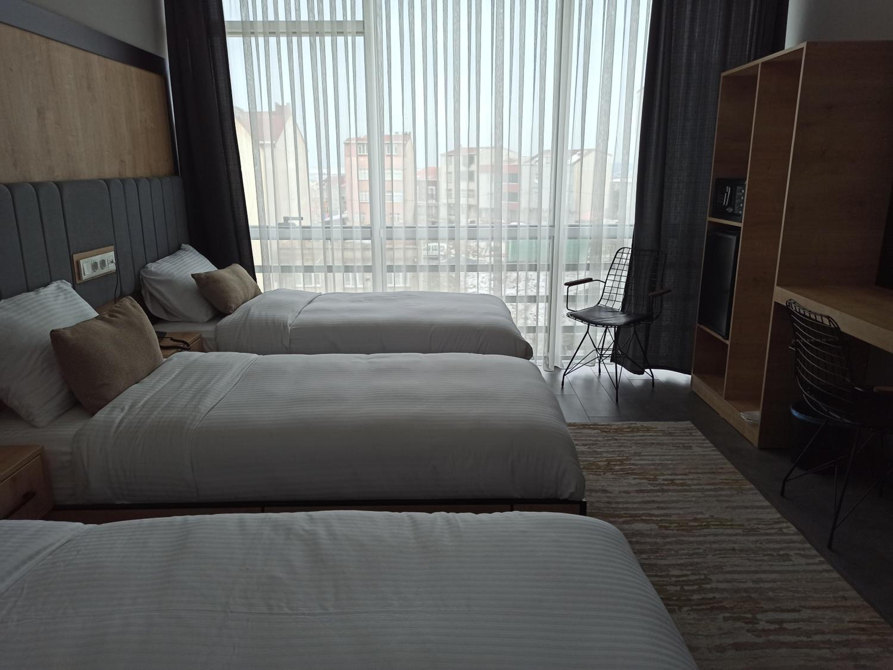 Deluxe Triple Room - Photo 6