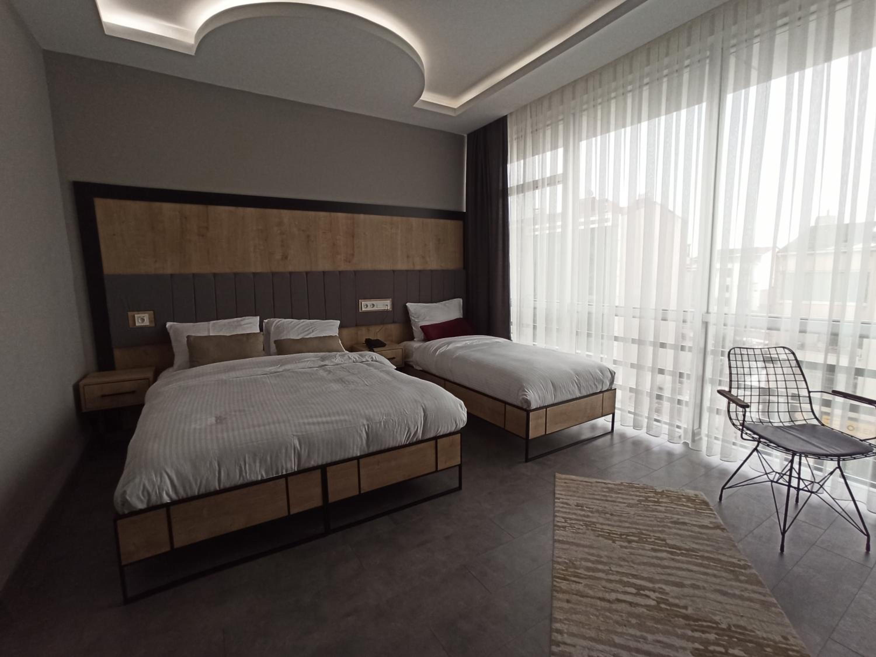 Deluxe Triple Room - Photo 1