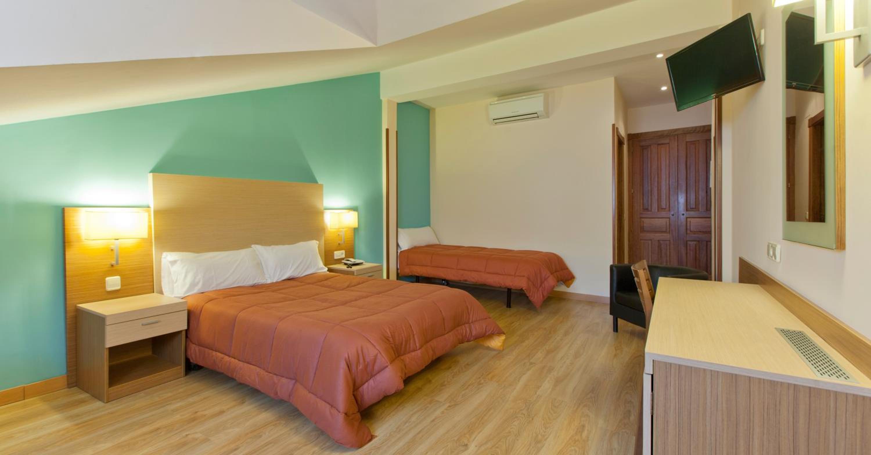 Doble con cama extra