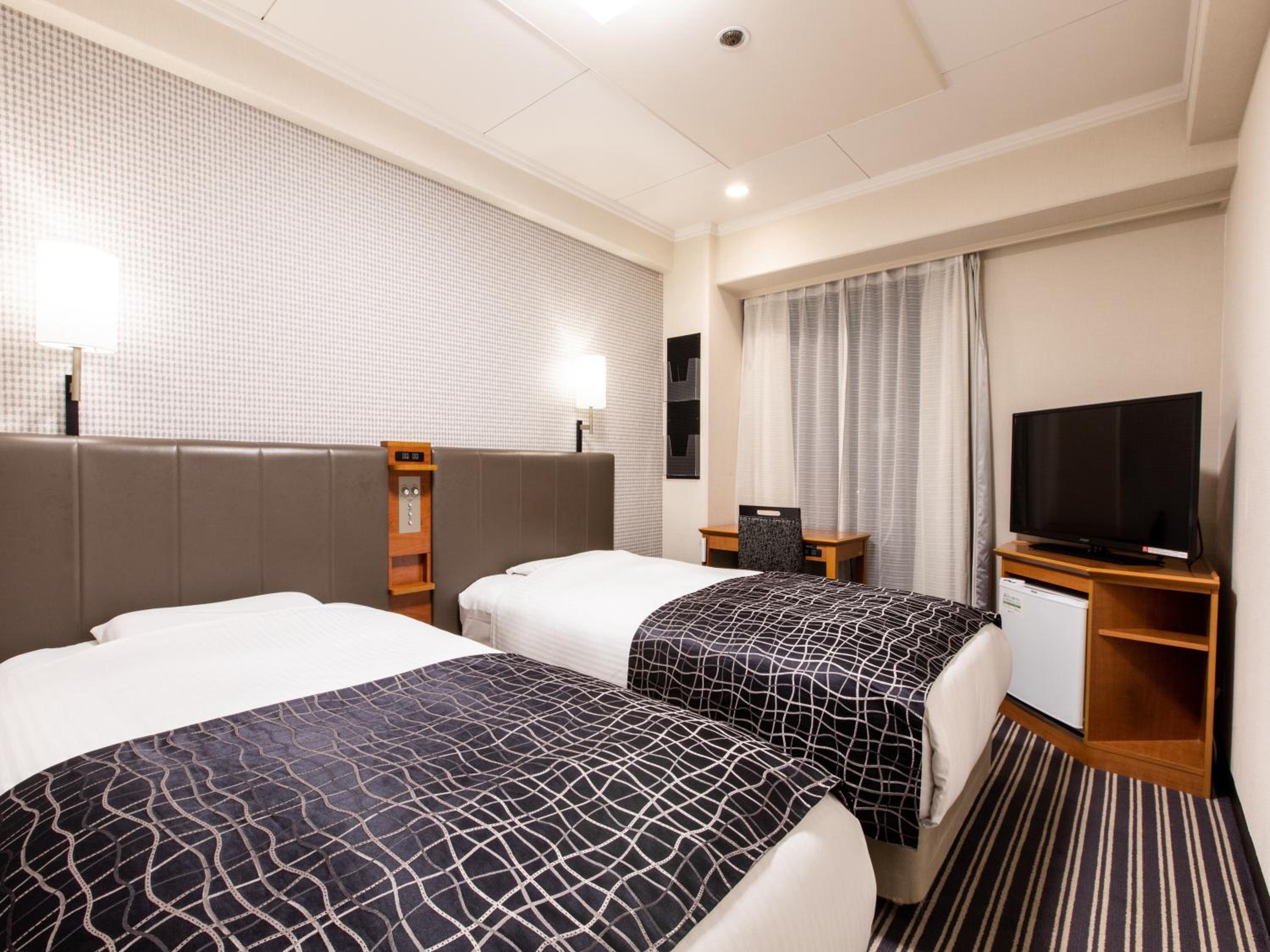 Twin Room - Non-Smoking - Photo 1