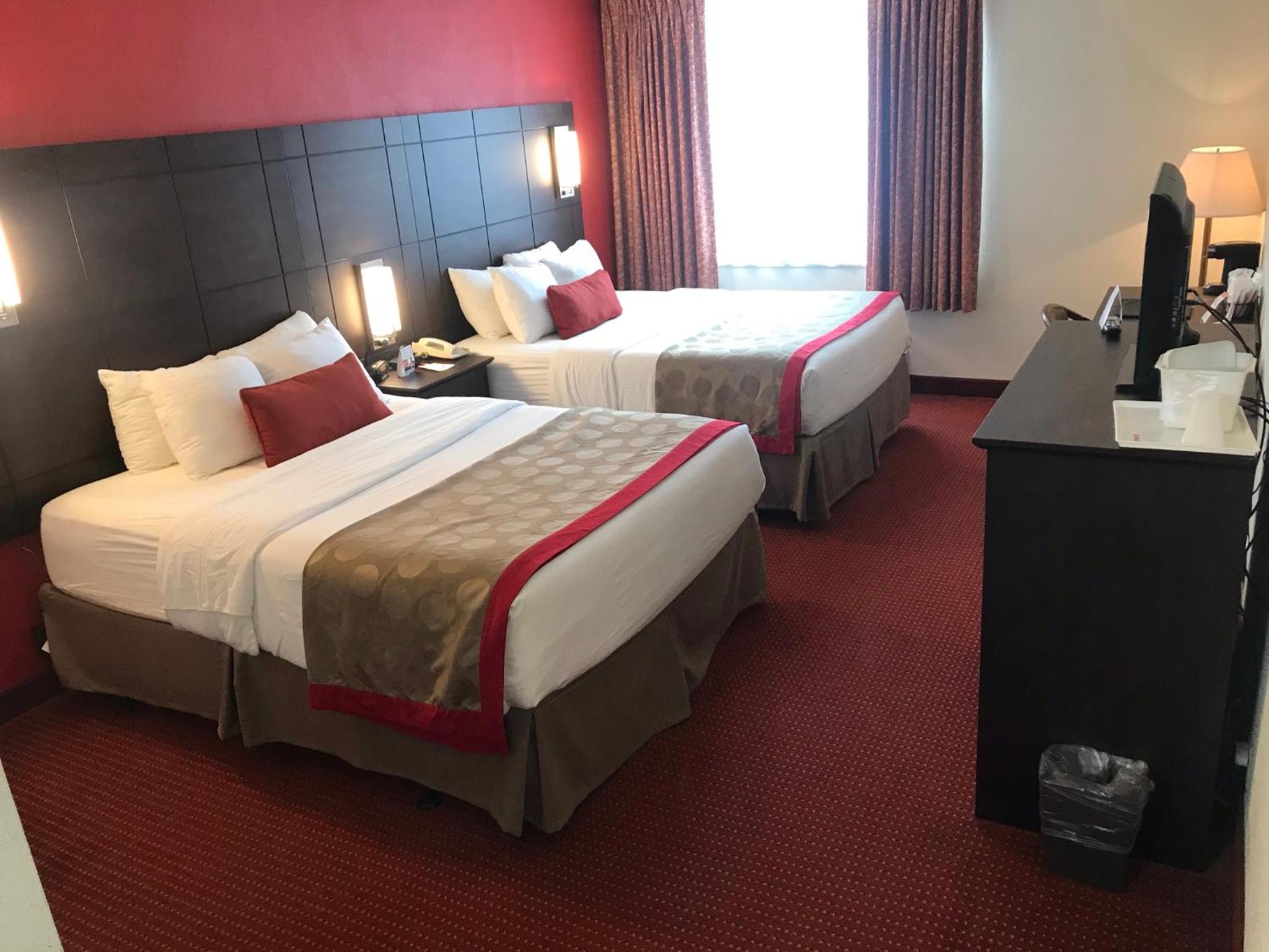 Deluxe Queen Room with Two Queen Beds - Non-Smoking photo 1