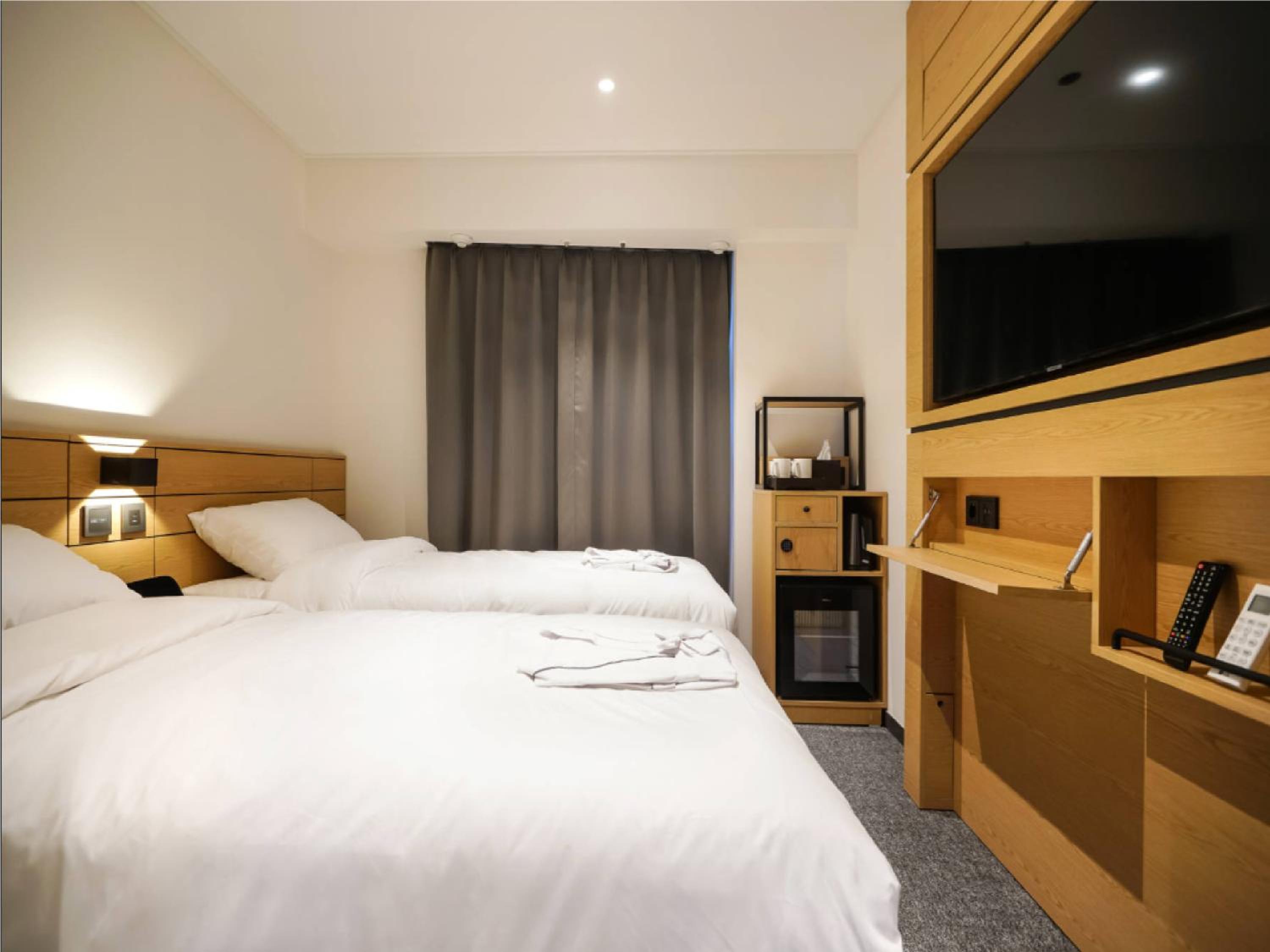 HighFloor Twin Room With Complimentary Breakfast - Photo 11