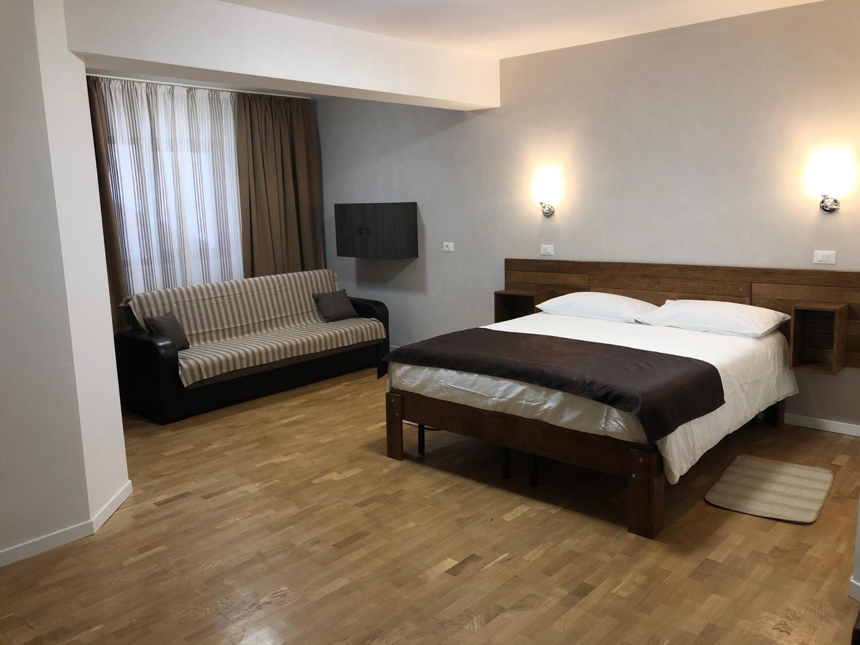 Deluxe Quadruple Room - Photo 3