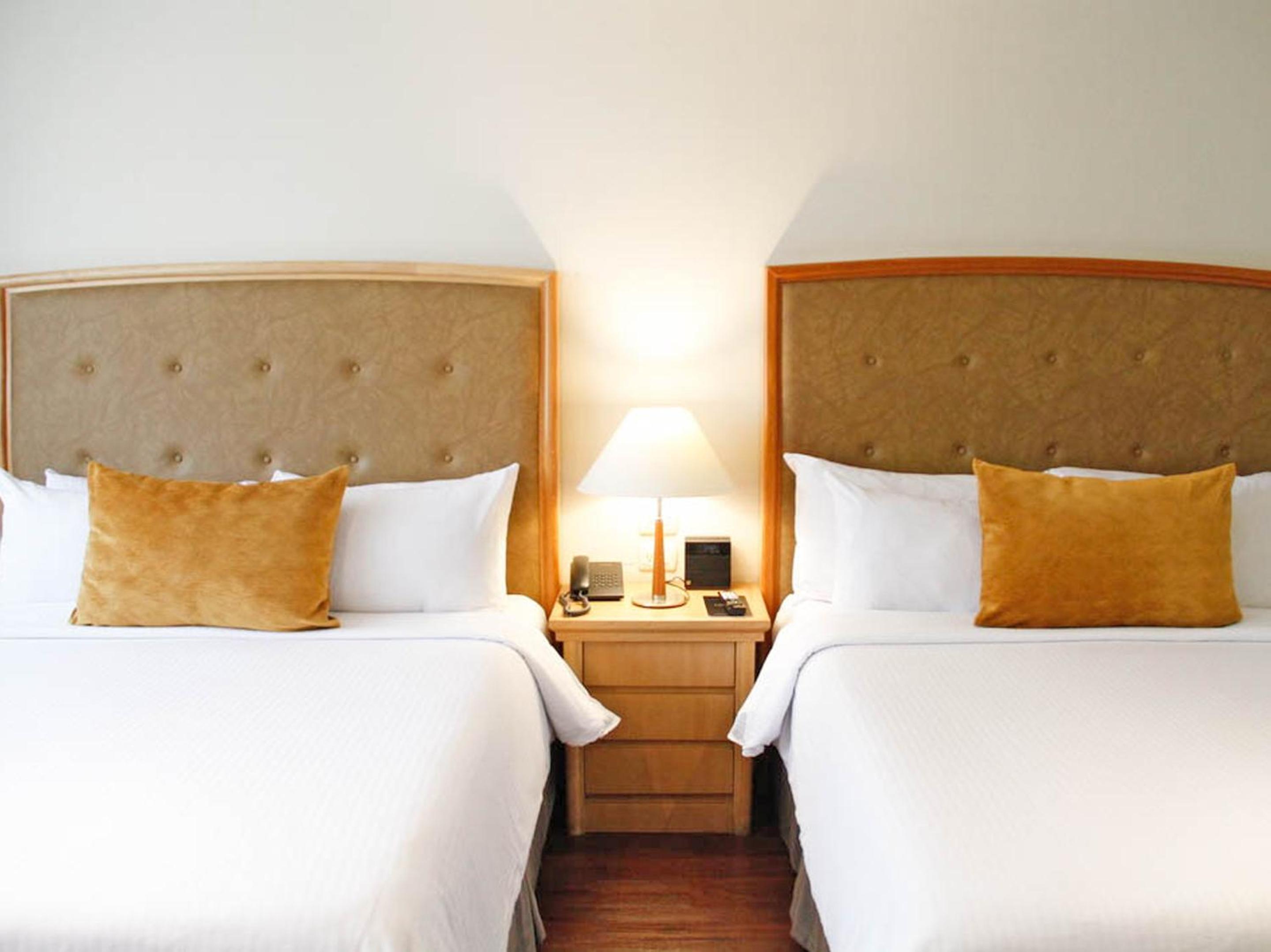 Queen Room with Two Queen Beds - Photo 6