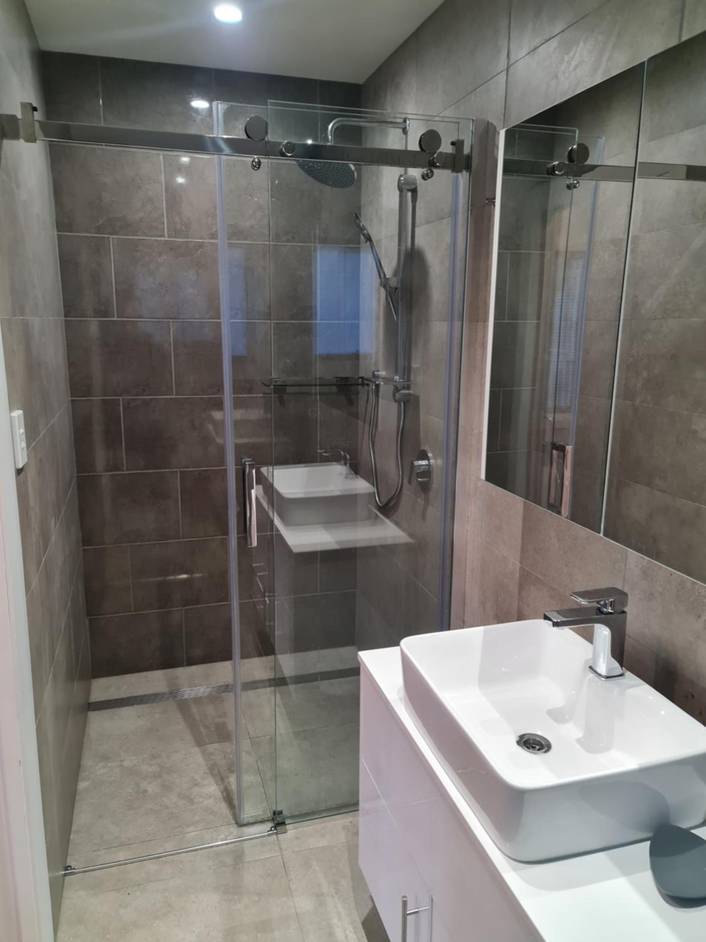 Three-Bedroom House - Photo 15