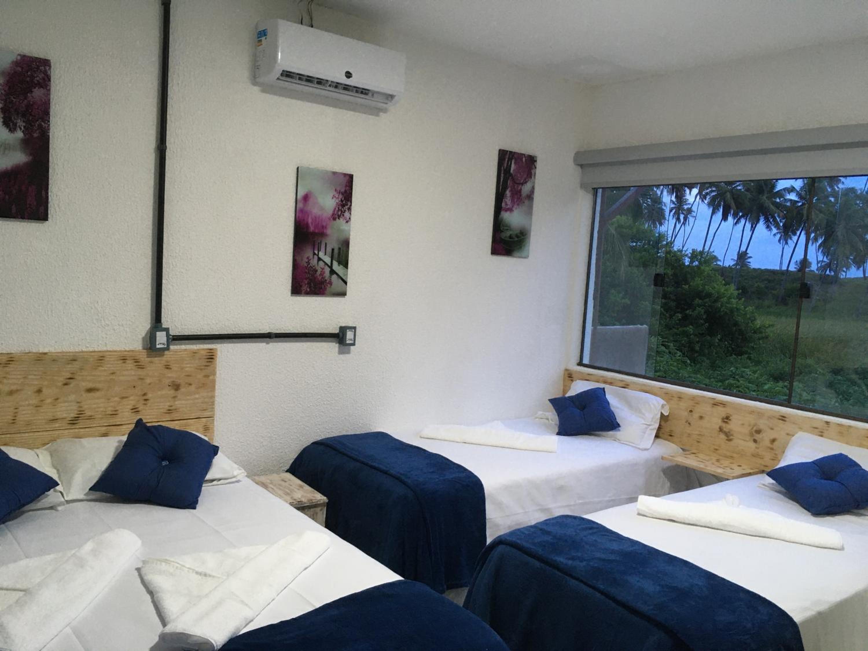 Deluxe Quadruple Room - Photo 11