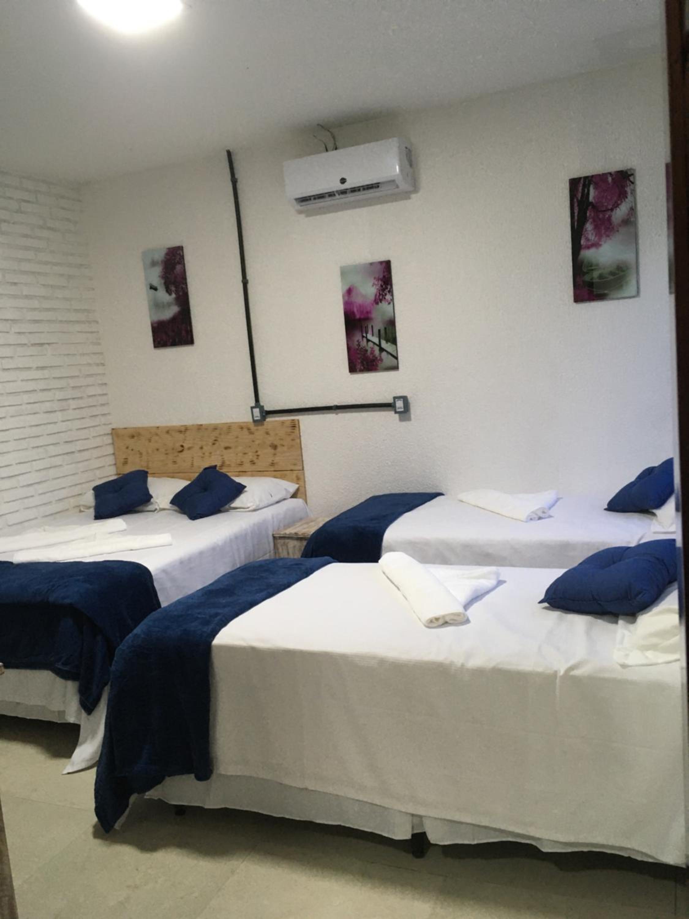 Deluxe Quadruple Room - Photo 12