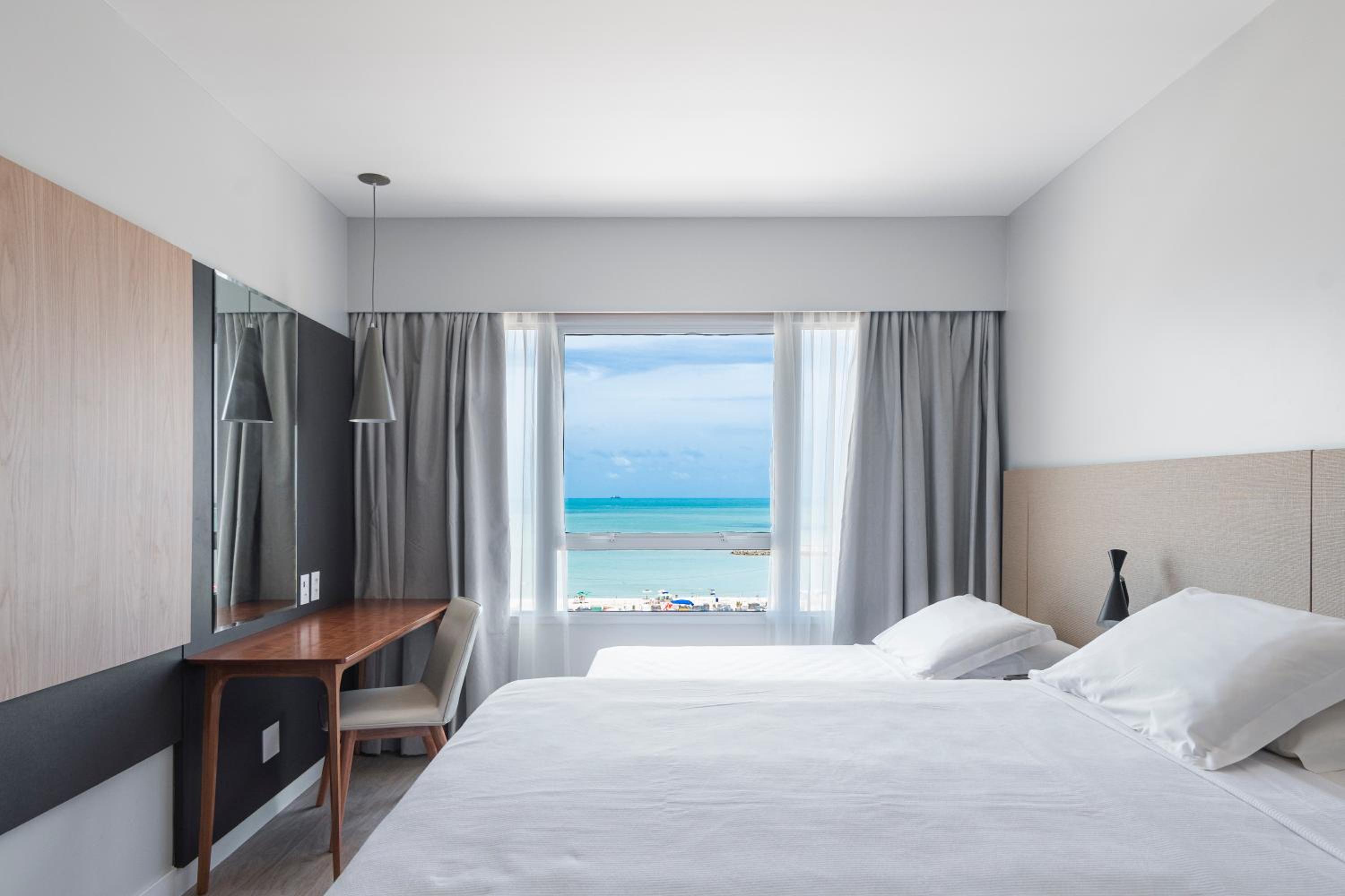 Quarto Triplo Superior casal vista mar