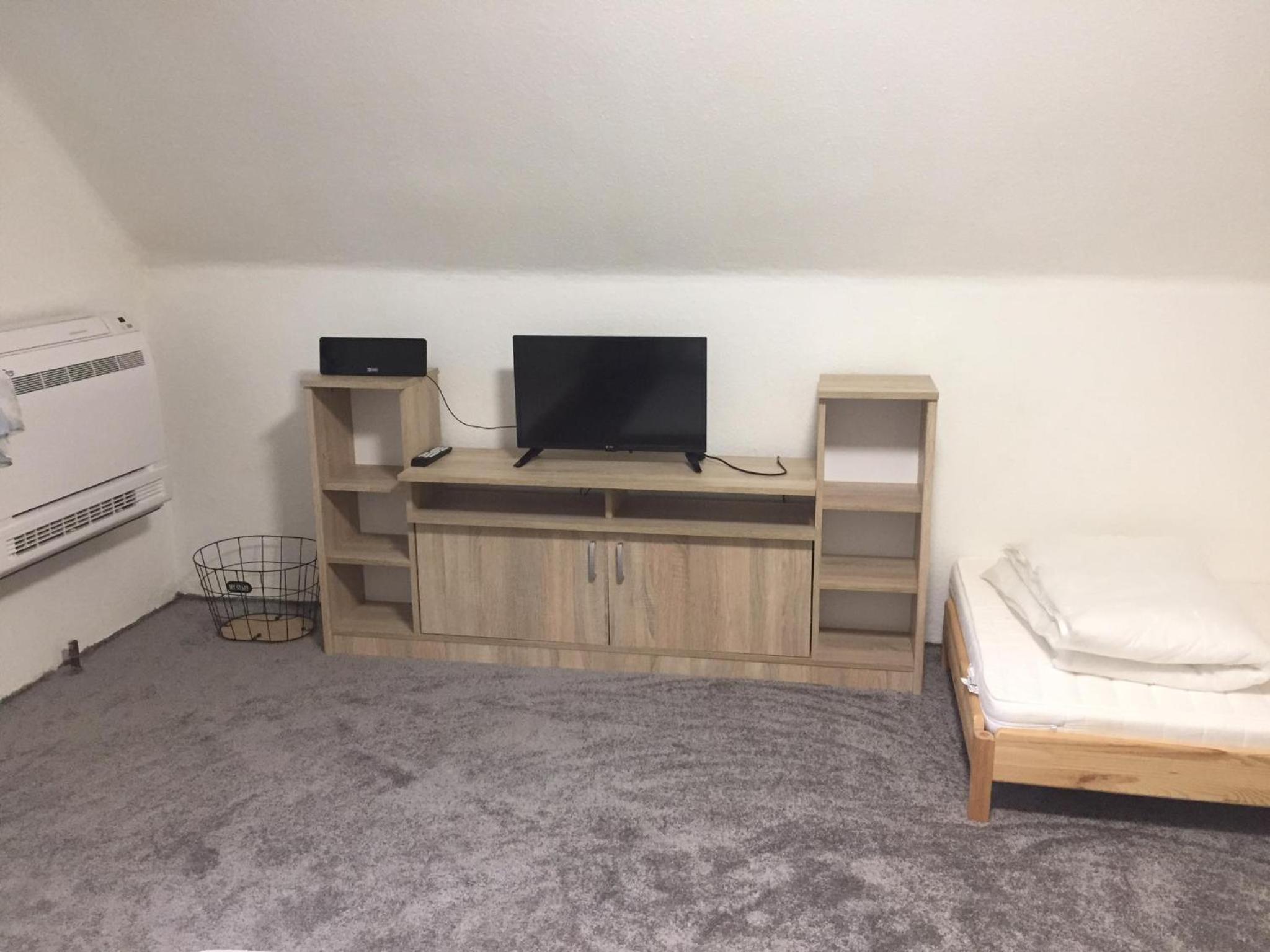 Four-Bedroom House - Photo 26