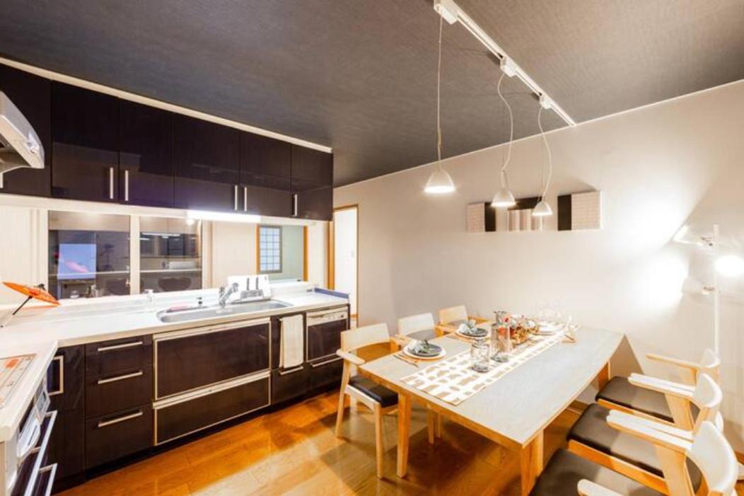 Four-Bedroom House - Photo 43