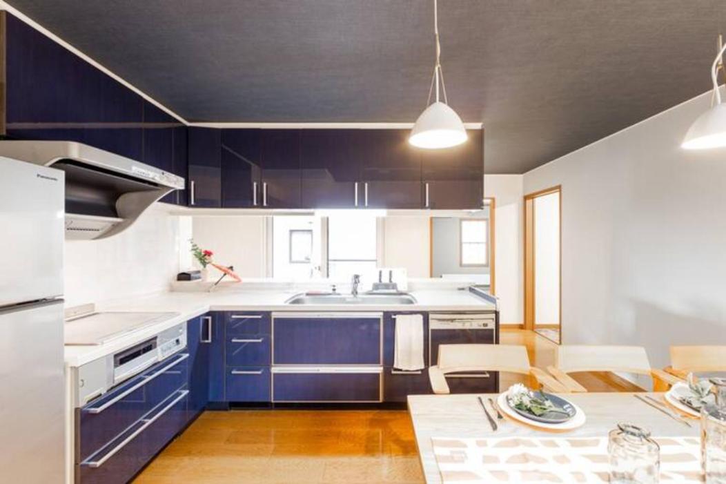 Four-Bedroom House - Photo 41