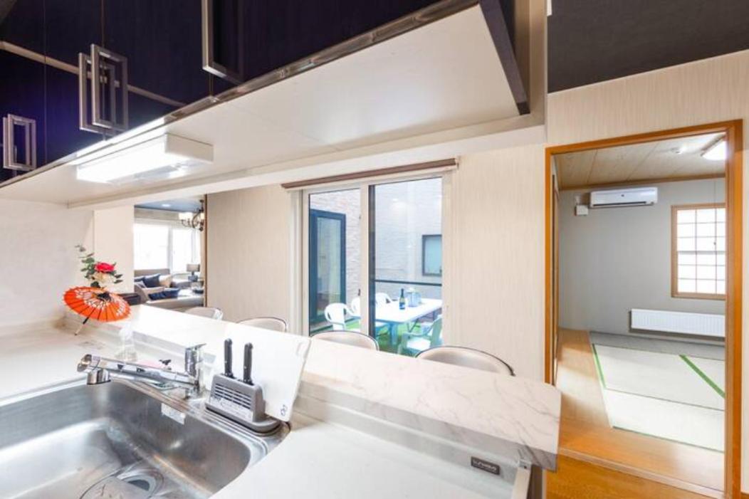 Four-Bedroom House - Photo 40