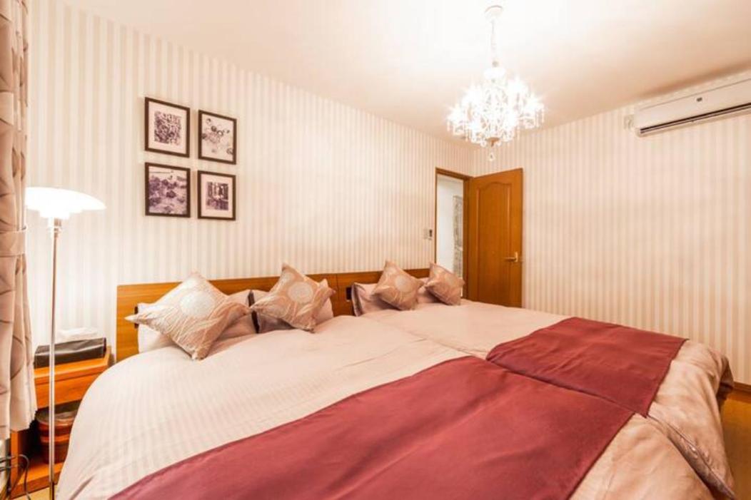 Four-Bedroom House - Photo 32