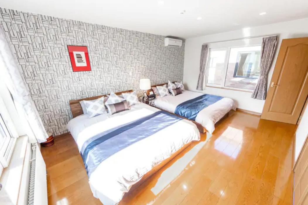 Four-Bedroom House - Photo 16