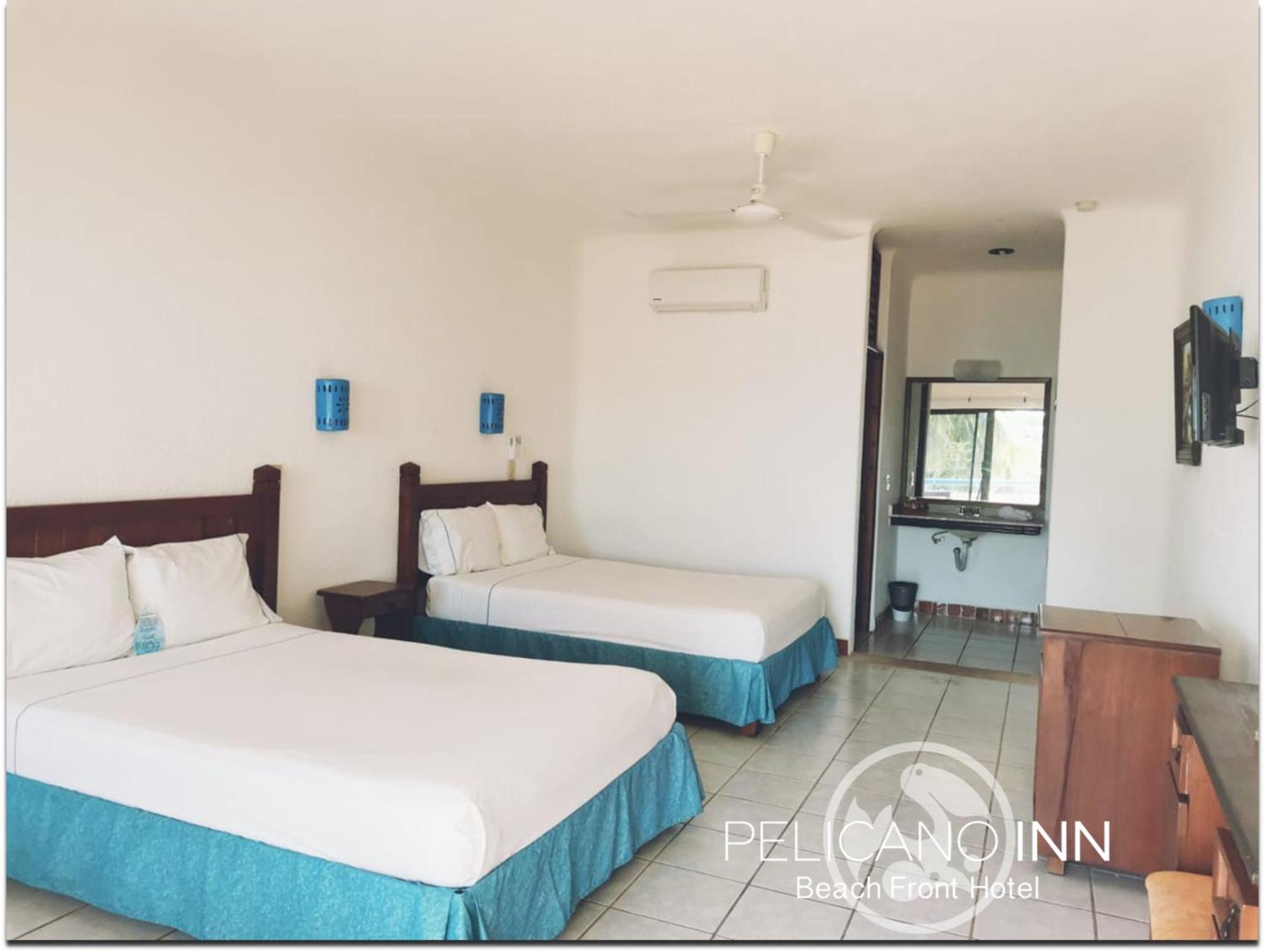 Double Room with Two Double Beds and Sea View - Photo 1