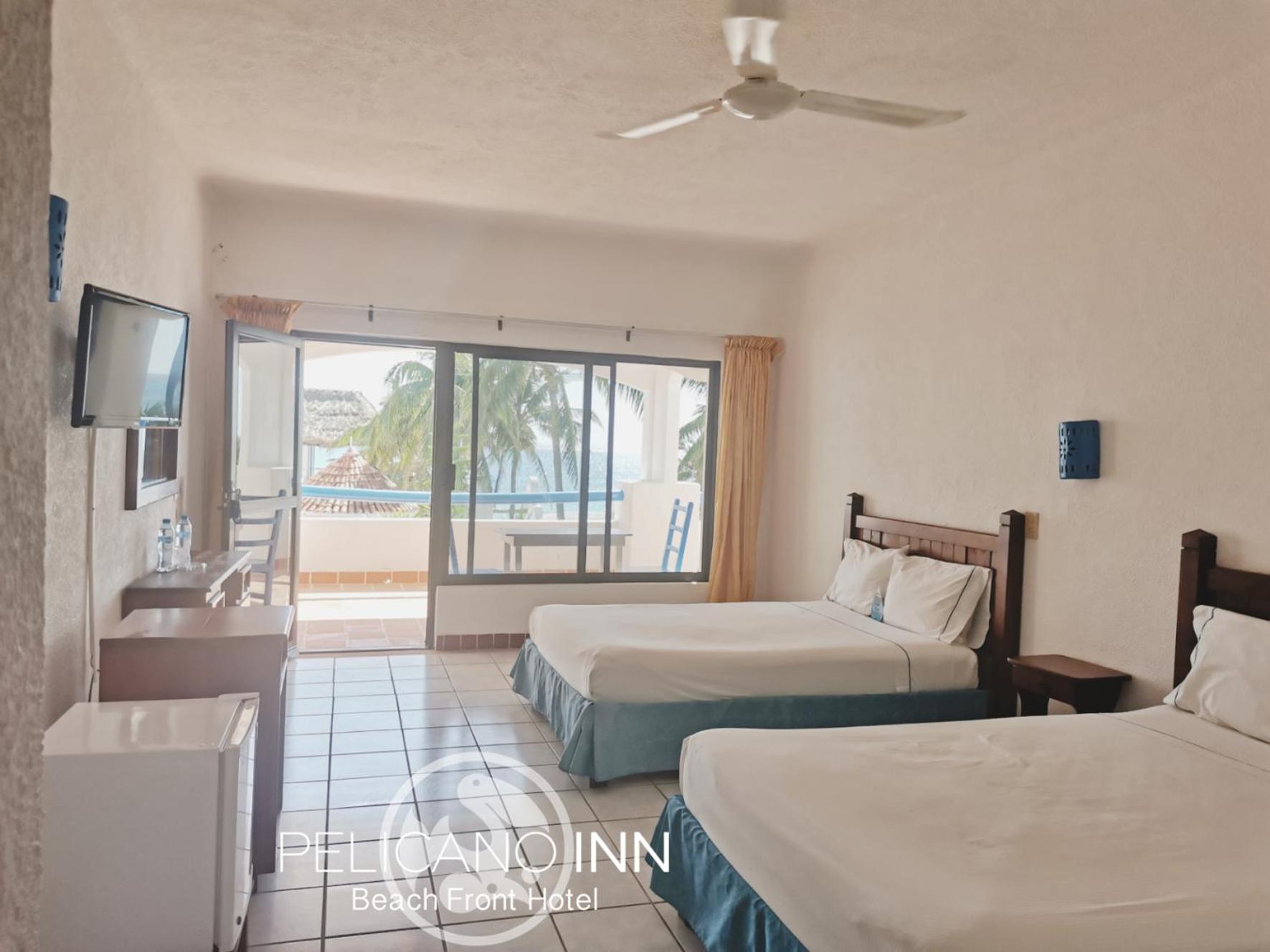 Double Room with Two Double Beds and Sea View - Photo 4