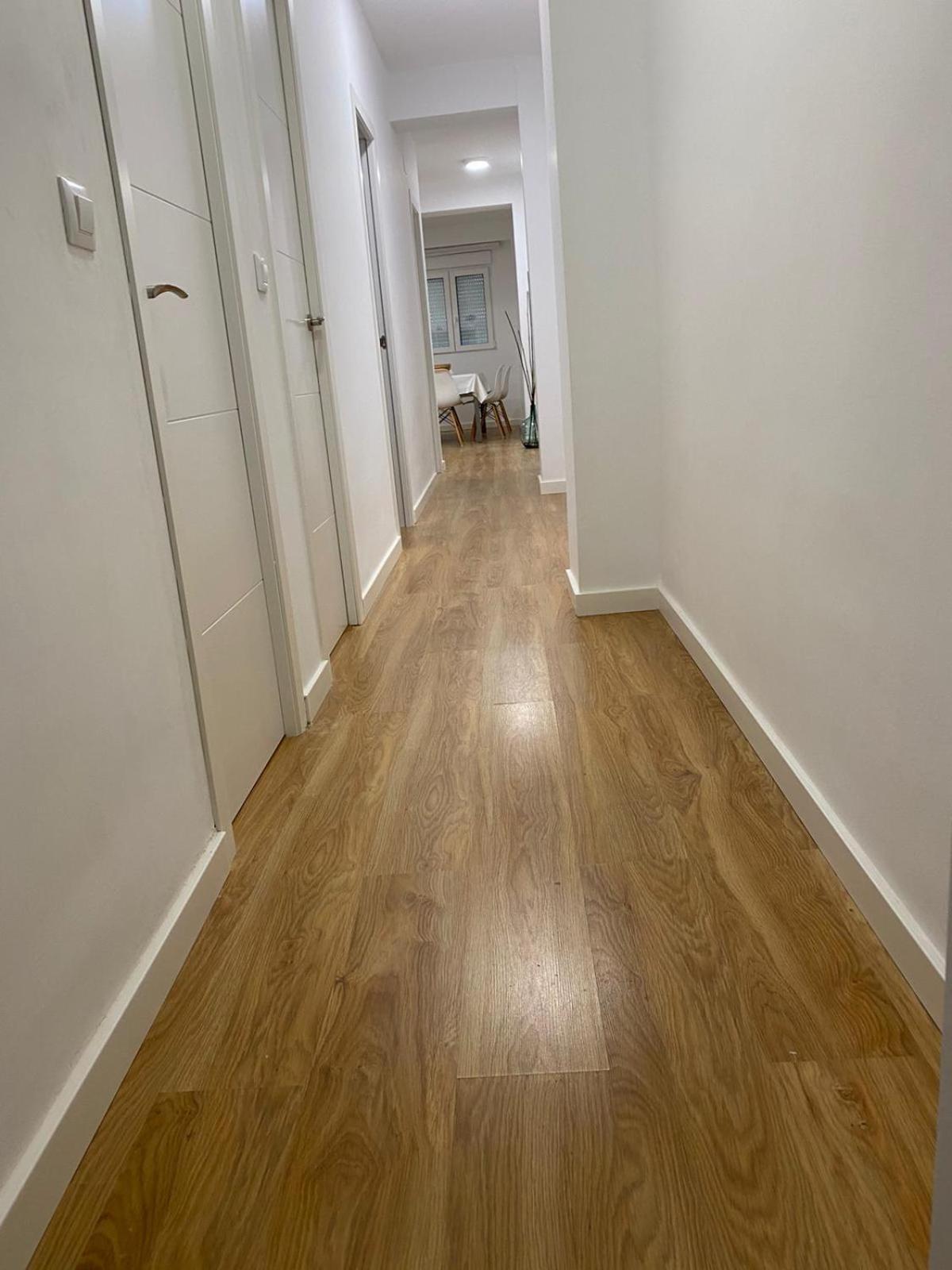 Three-Bedroom Apartment - Photo 12