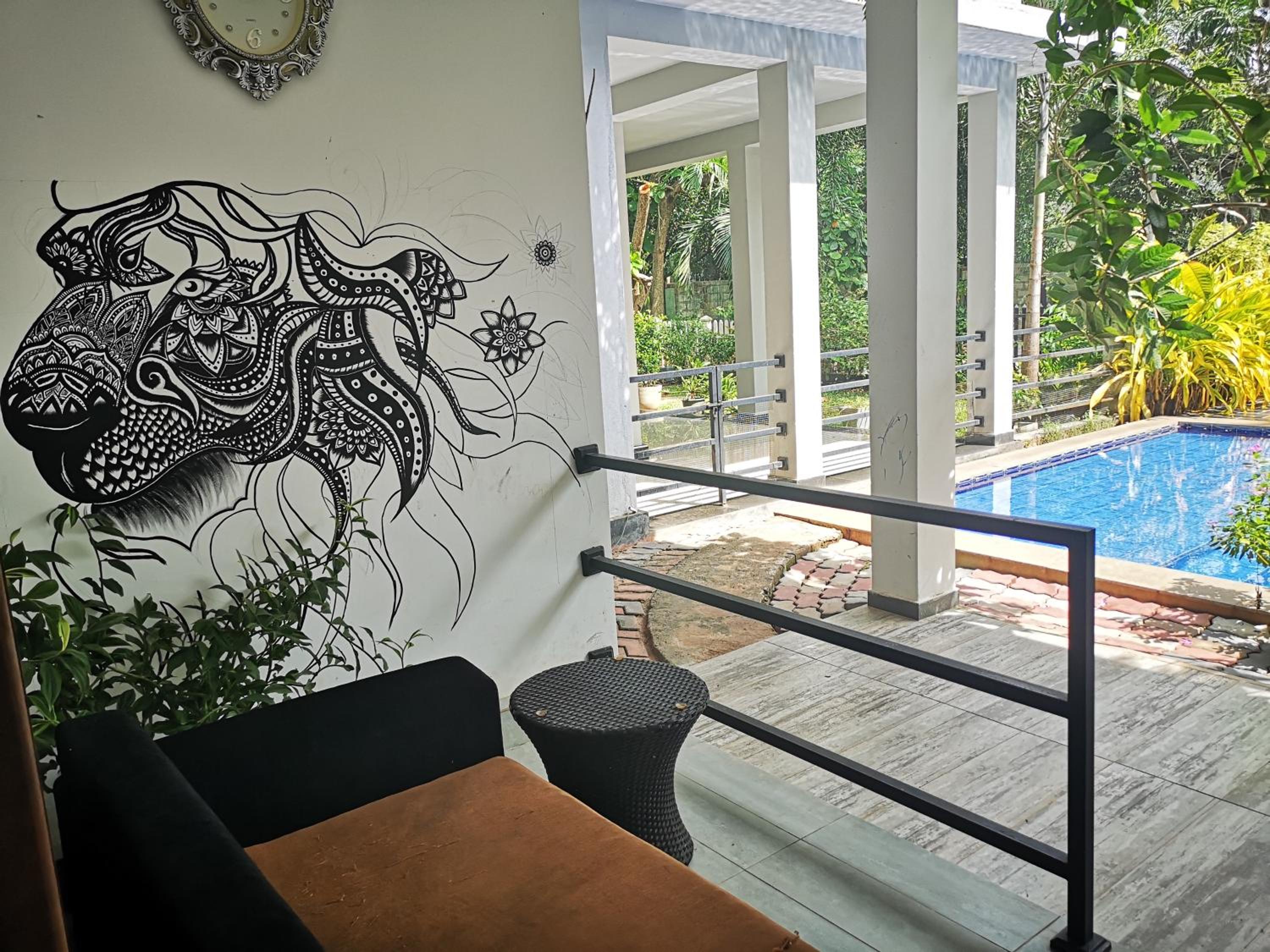 Deluxe Room with Balcony & Garden View (15% off on Food & Beverage and Early Check-in and Late Check-out on Availability Basis)
