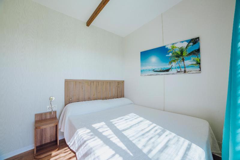 Bungalow Deluxe con Vista al Jardín.