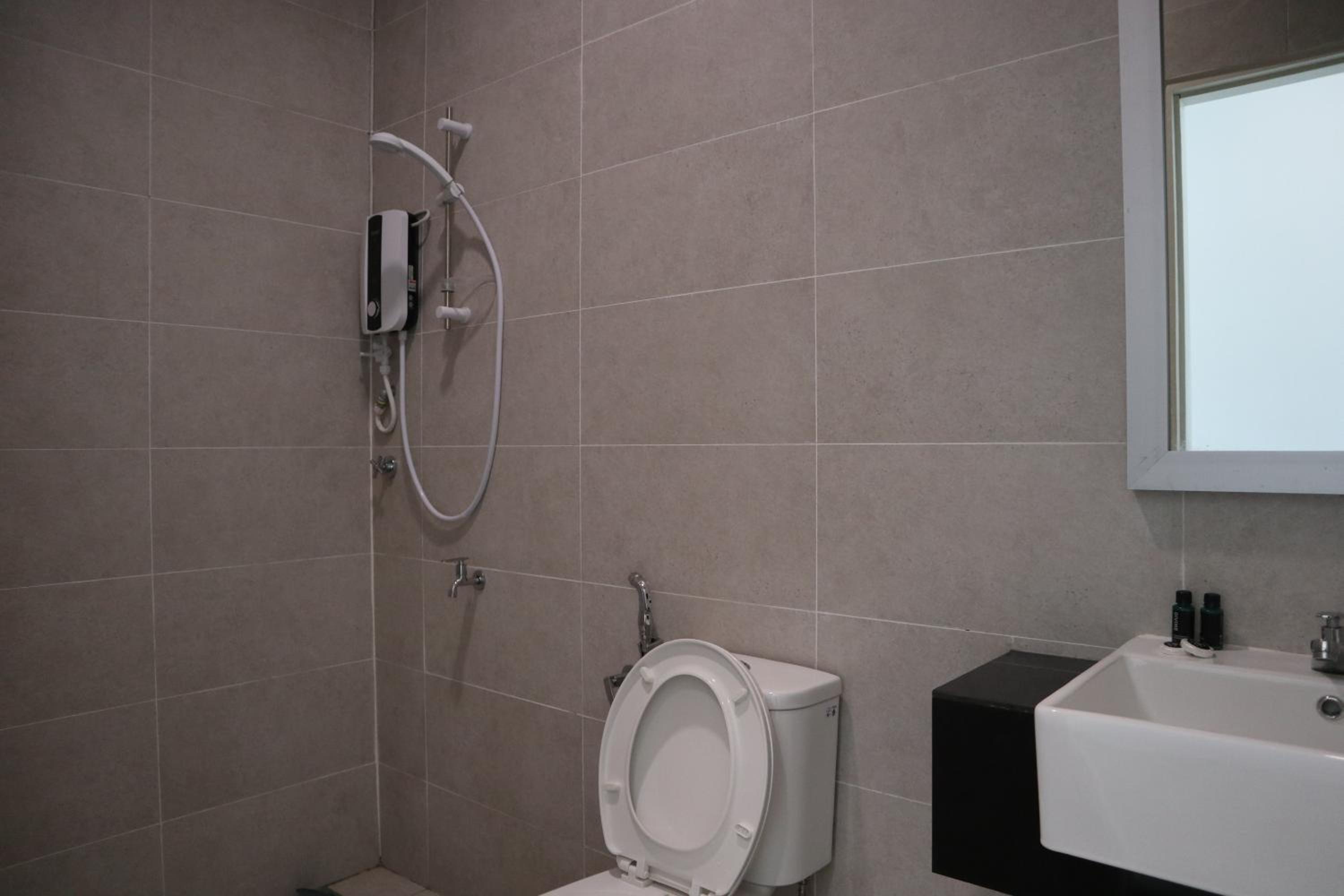 Three-Bedroom Apartment - Photo 9