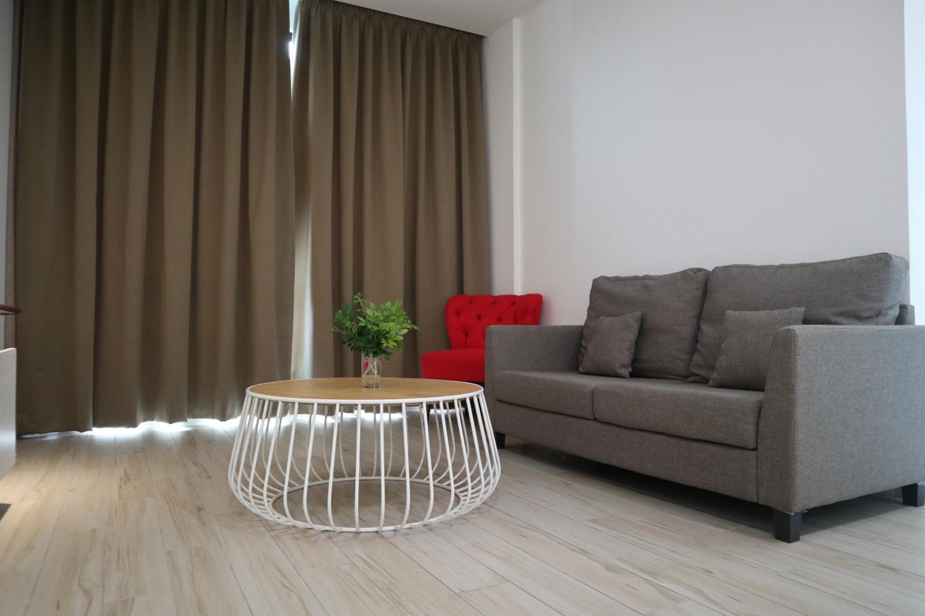 Three-Bedroom Apartment - Photo 10