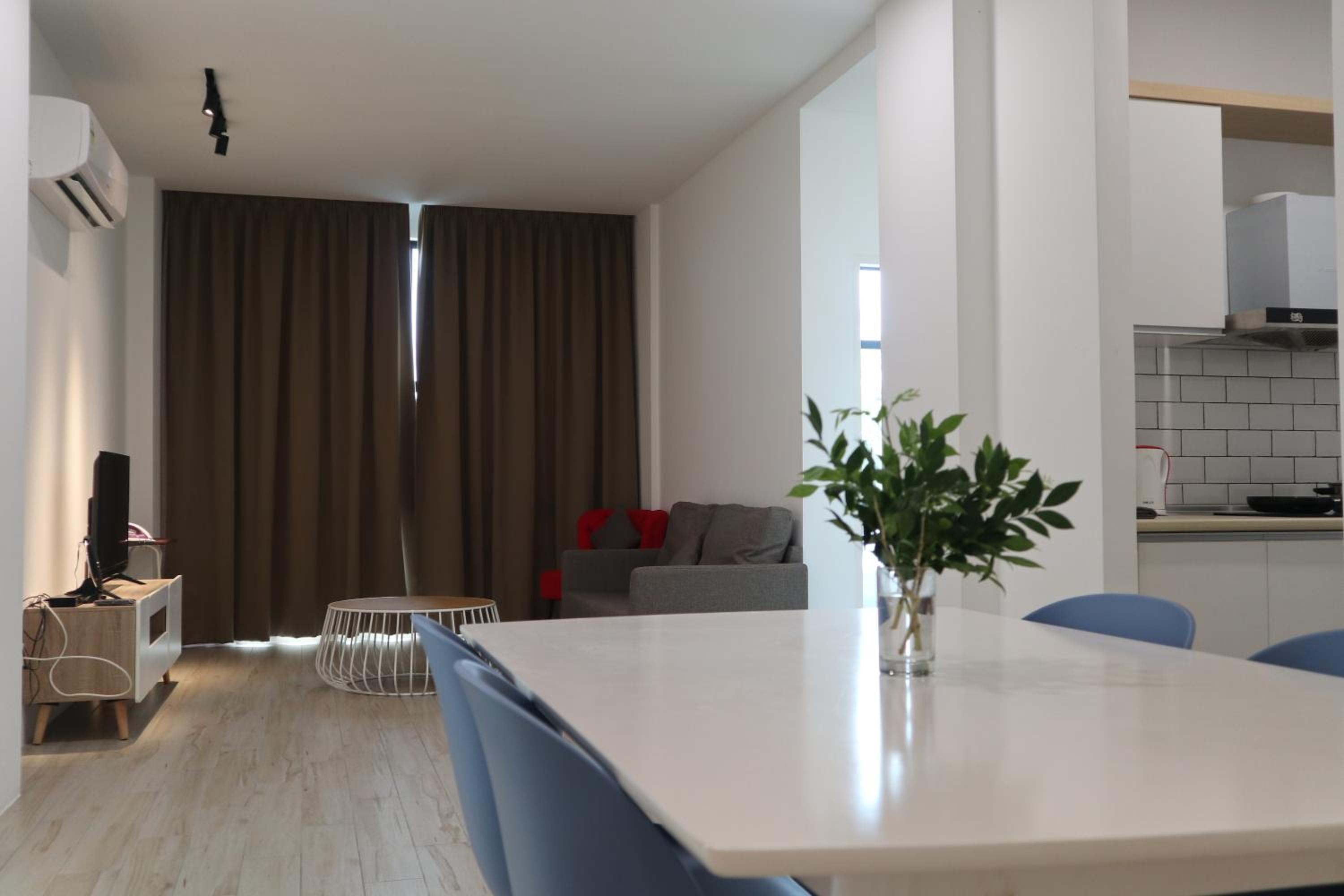 Three-Bedroom Apartment - Photo 11