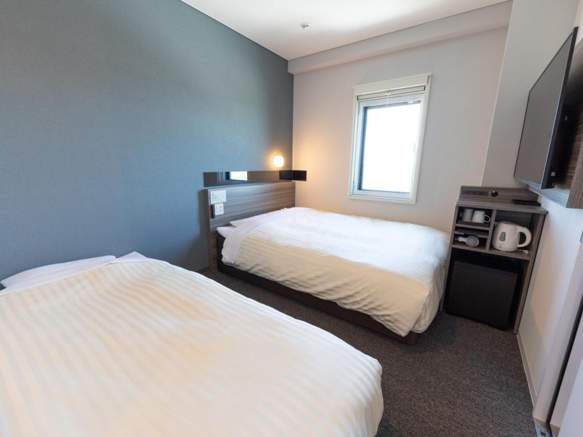 Twin Room with Extra Bed - Non-Smoking - Photo 3