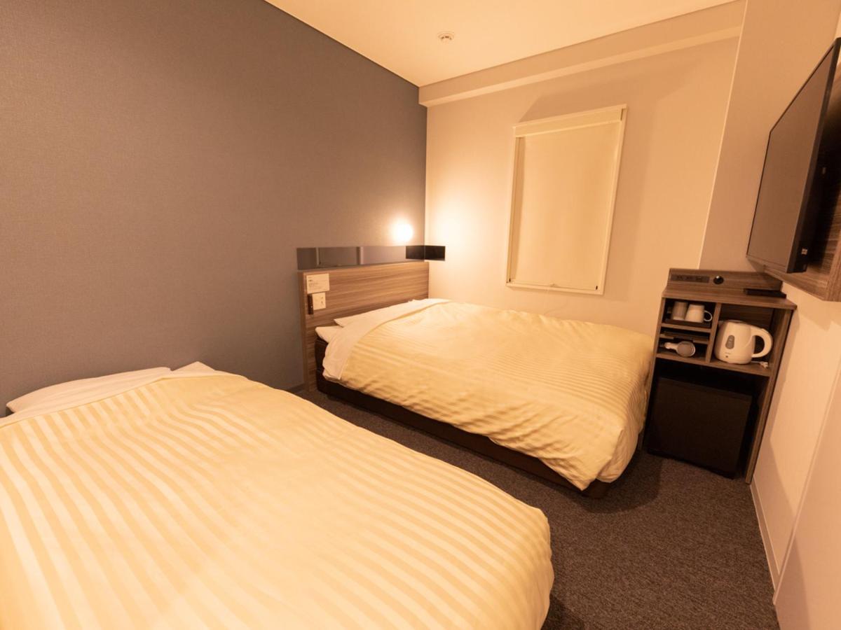 Twin Room with Extra Bed - Non-Smoking - Photo 2