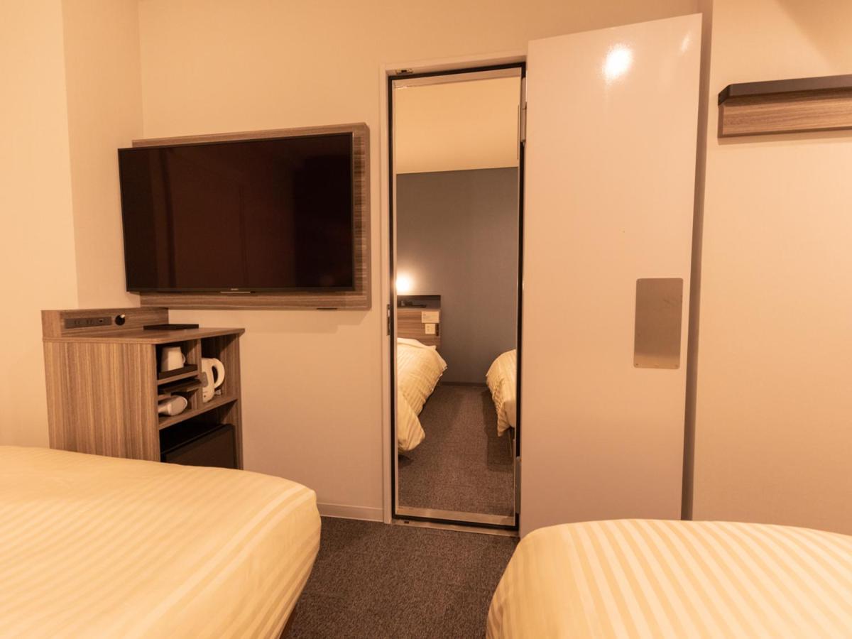 Economy Quadruple Room - Non-Smoking - Photo 1