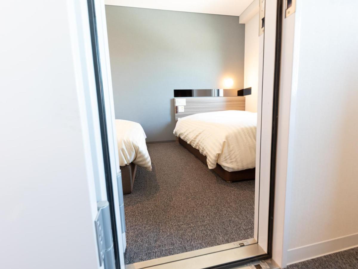 Economy Quadruple Room - Non-Smoking - Photo 3