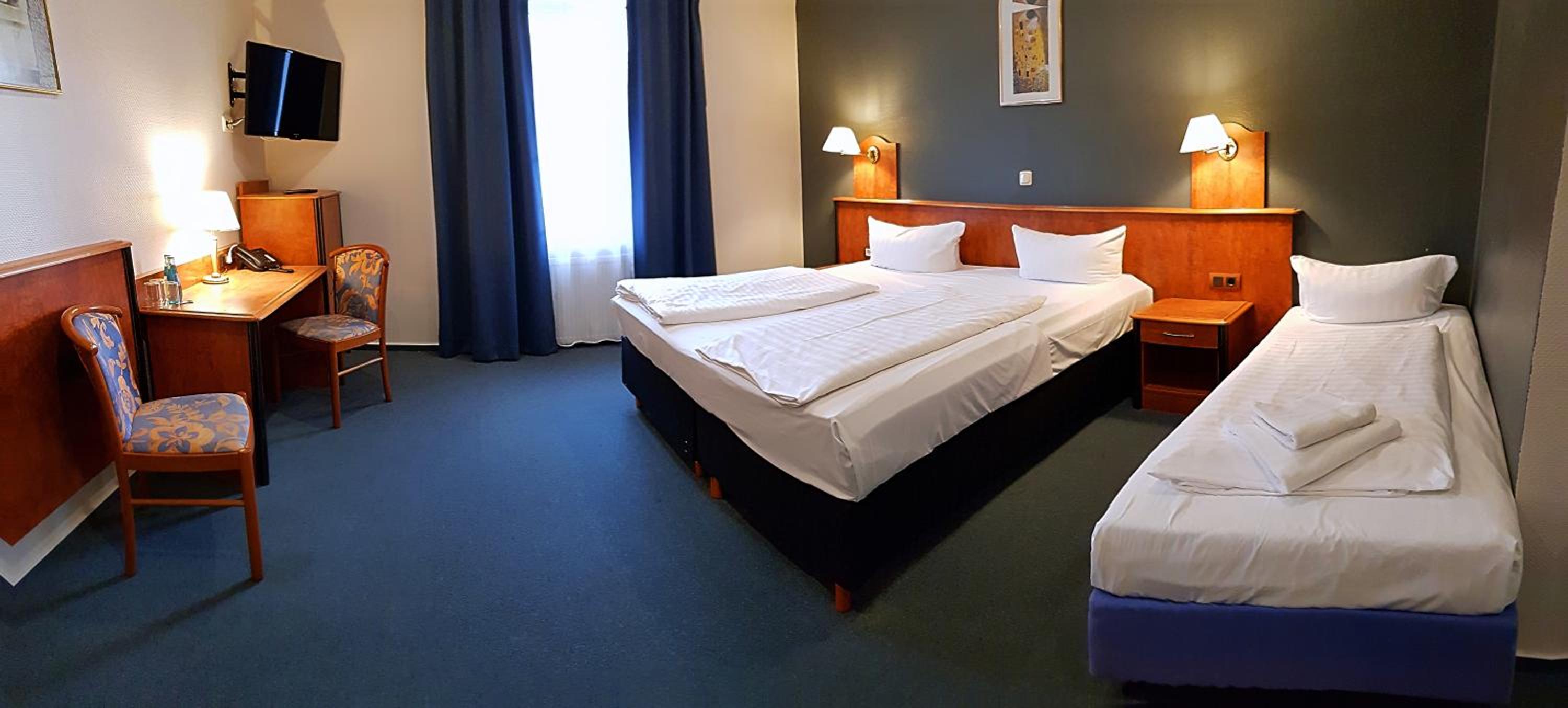 Standard Triple Room - Photo 4