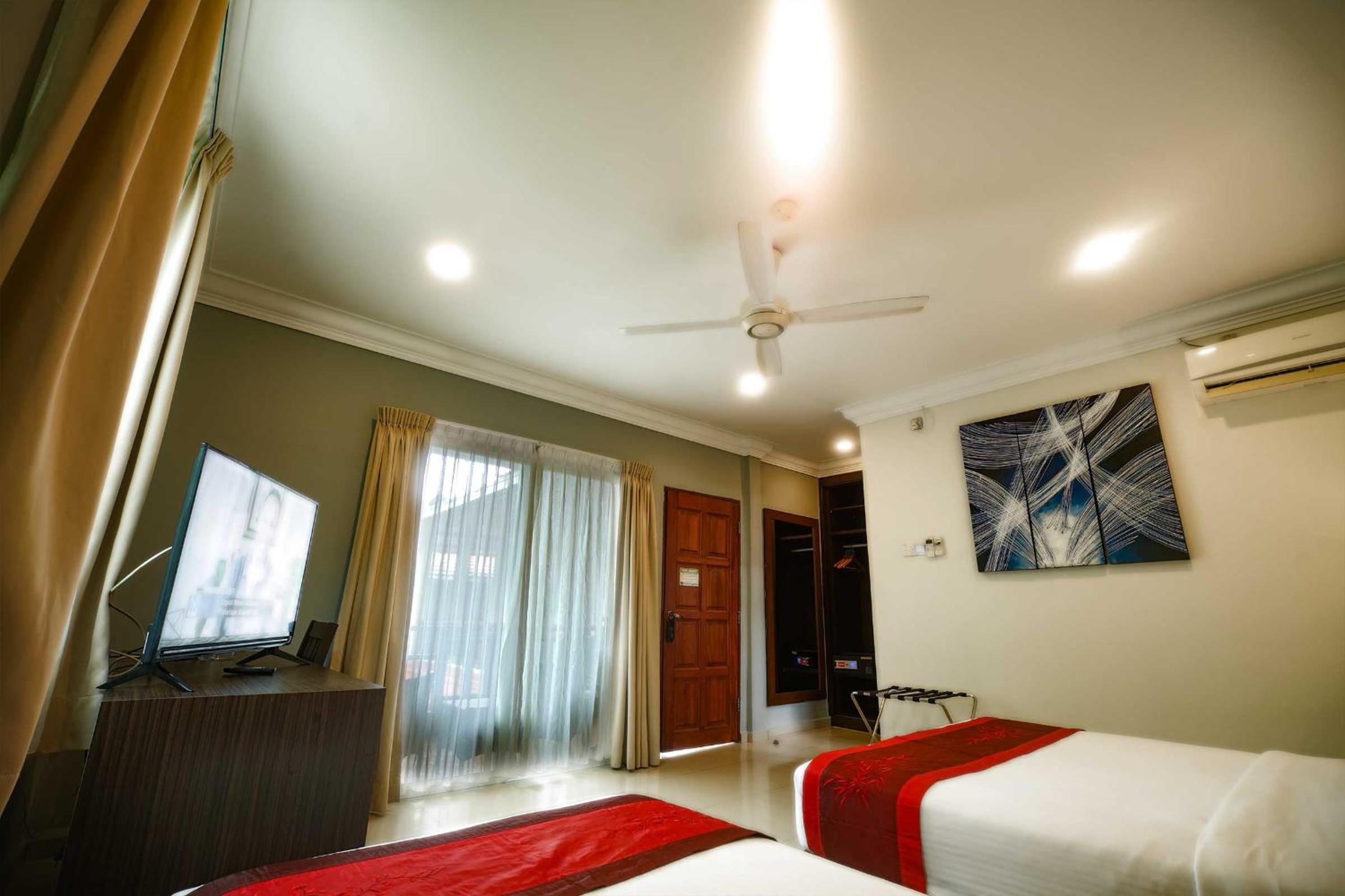 Deluxe Triple Room - Photo 3