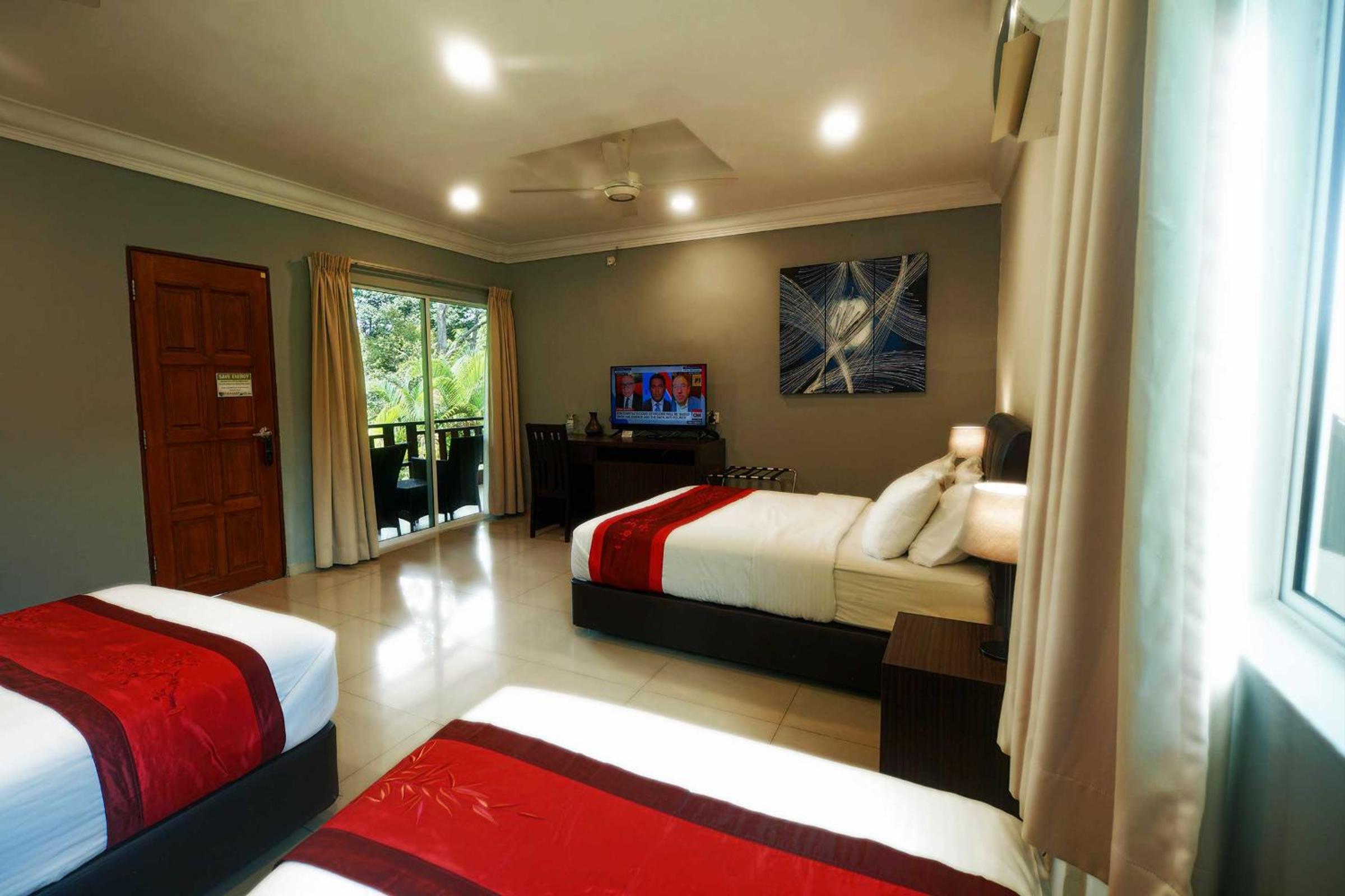 Deluxe Quadruple Room - Photo 10