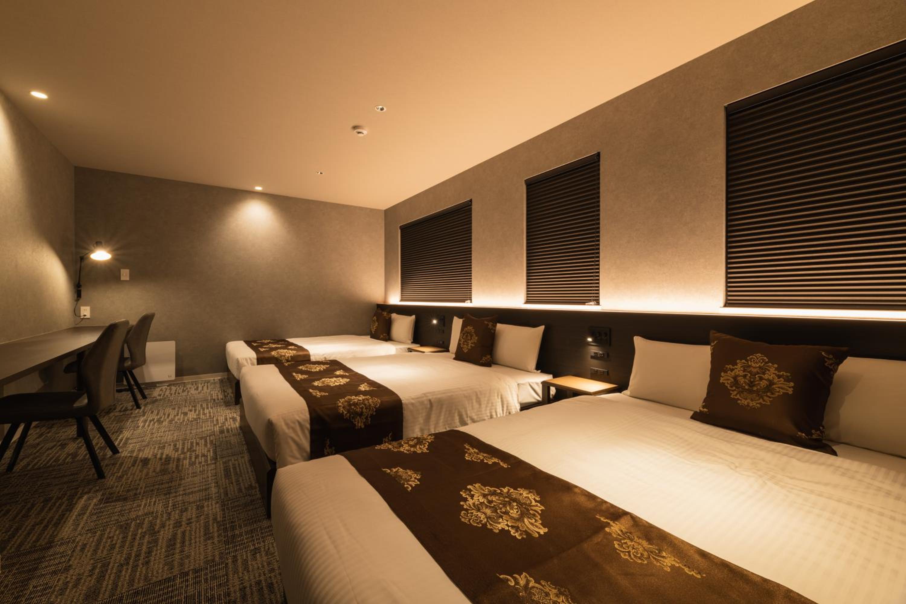 Deluxe Triple Room - Photo 1