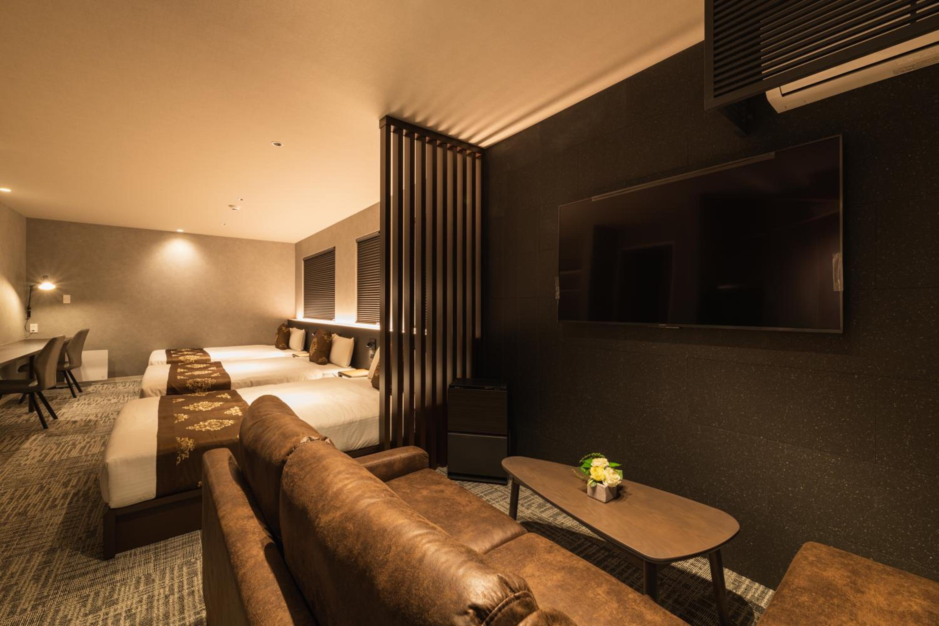 Deluxe Triple Room - Photo 8