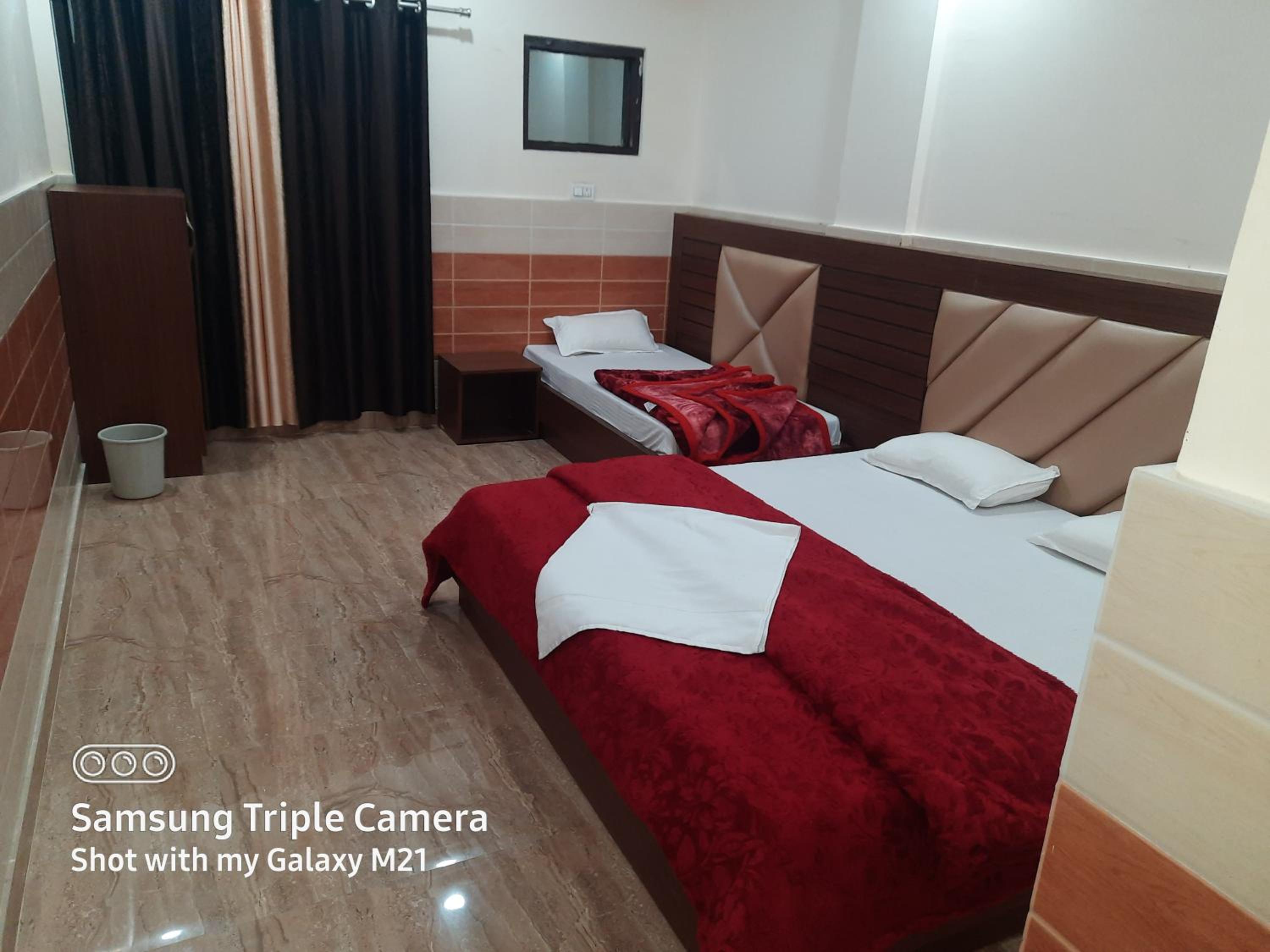 Deluxe Triple Room - Photo 12