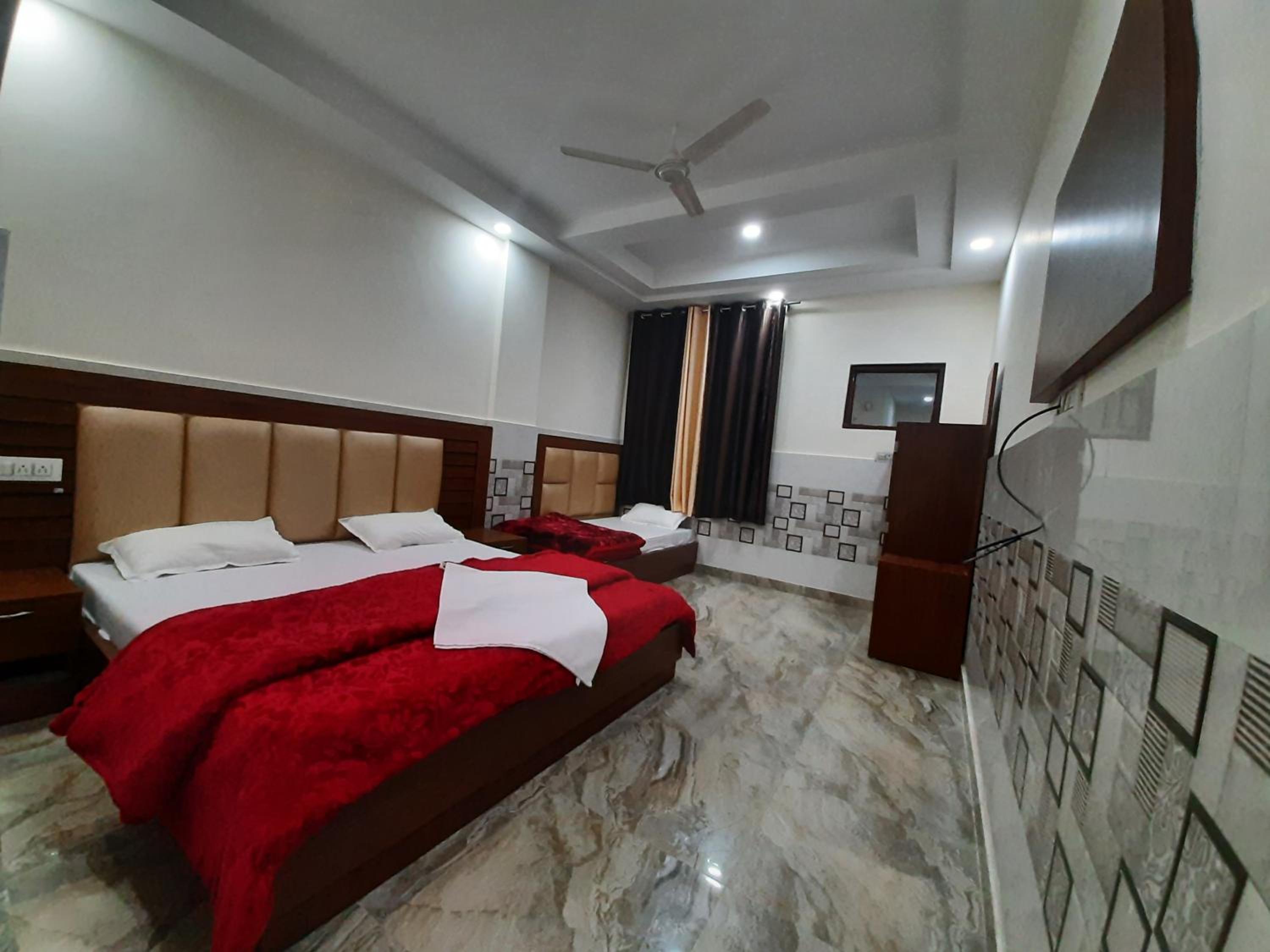 Deluxe Triple Room - Photo 11
