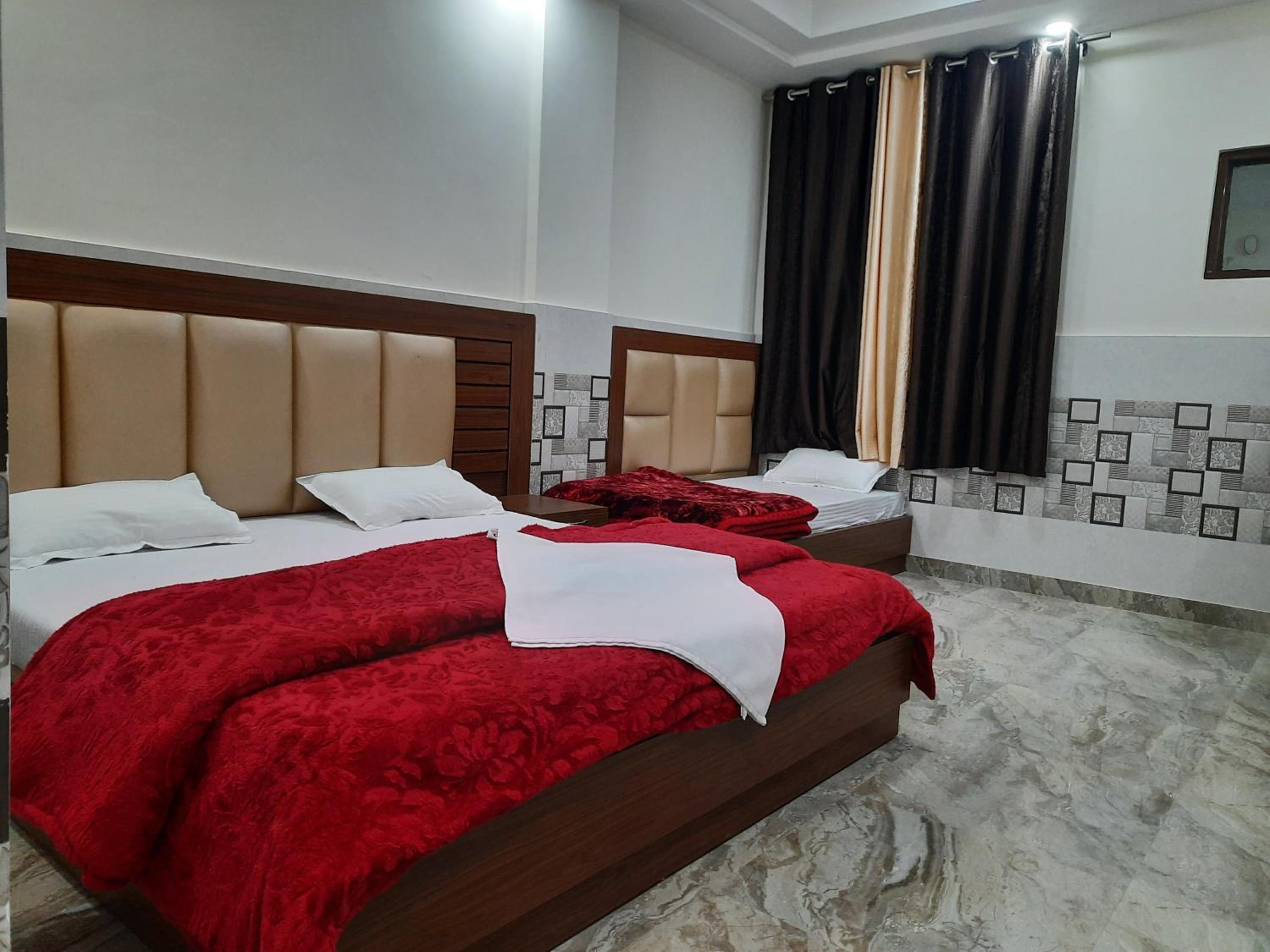 Deluxe Triple Room - Photo 16