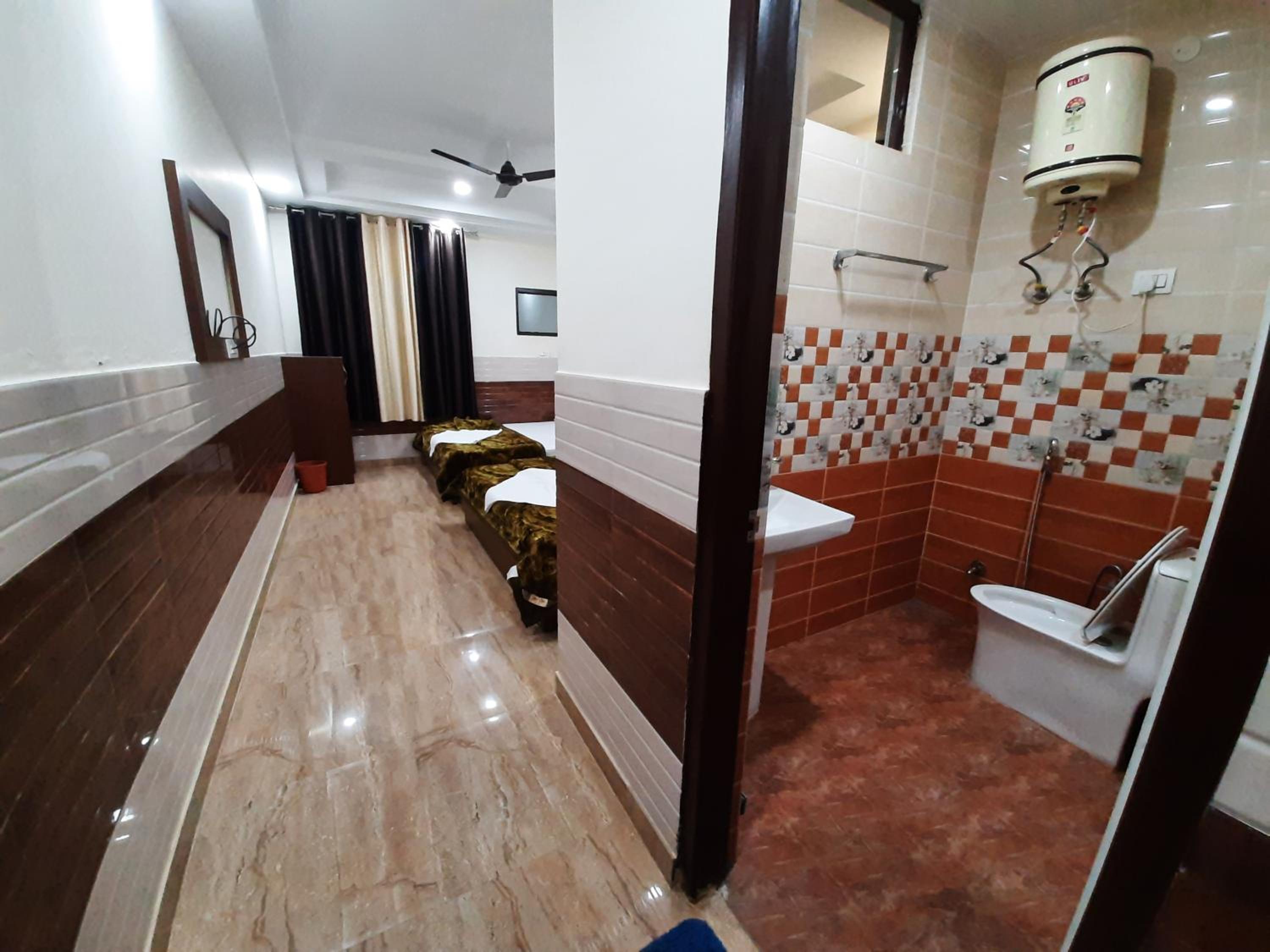 Deluxe Quadruple Room - Photo 1