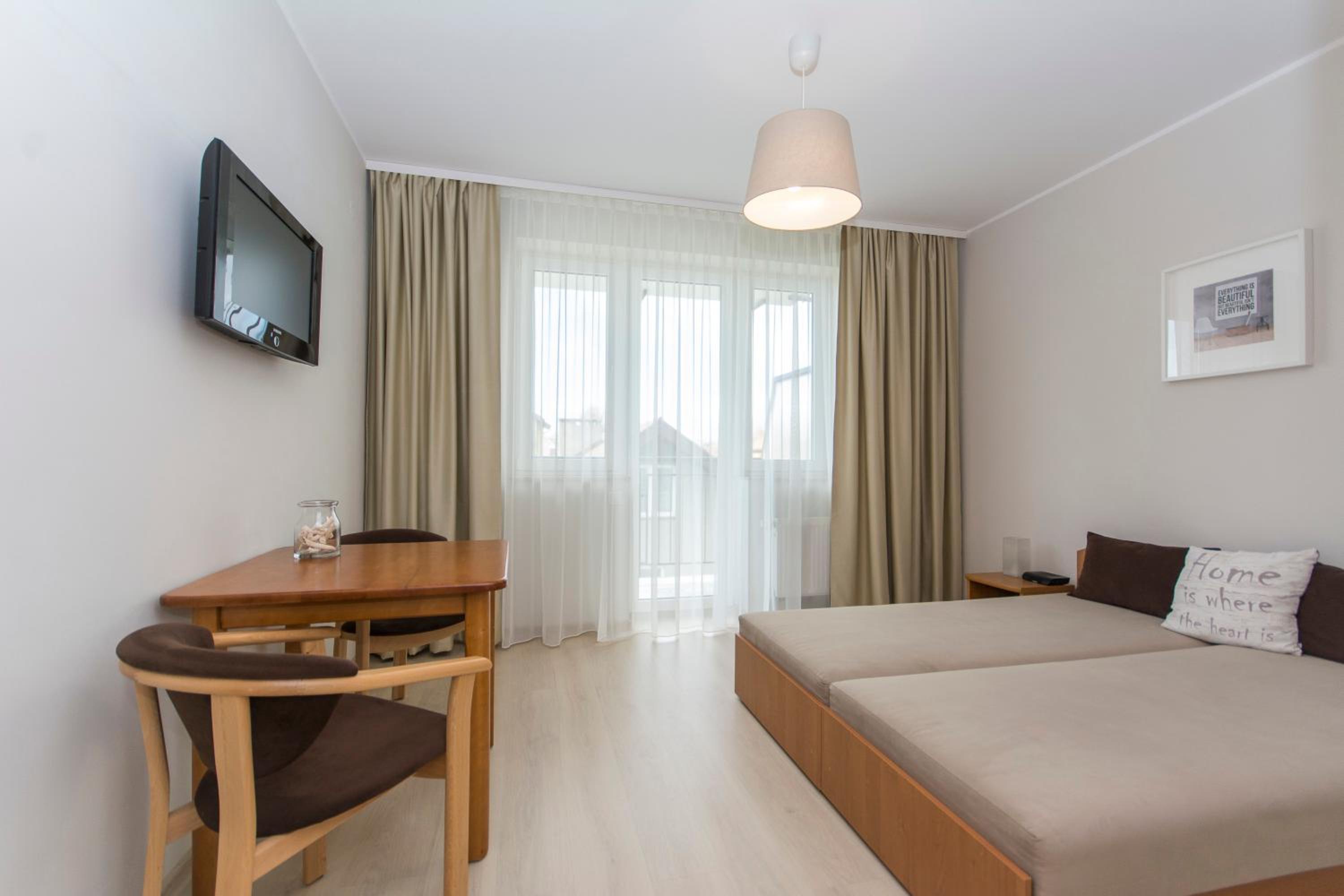 Double Room with Balcony (2 Adults + 1 Child) photo 2