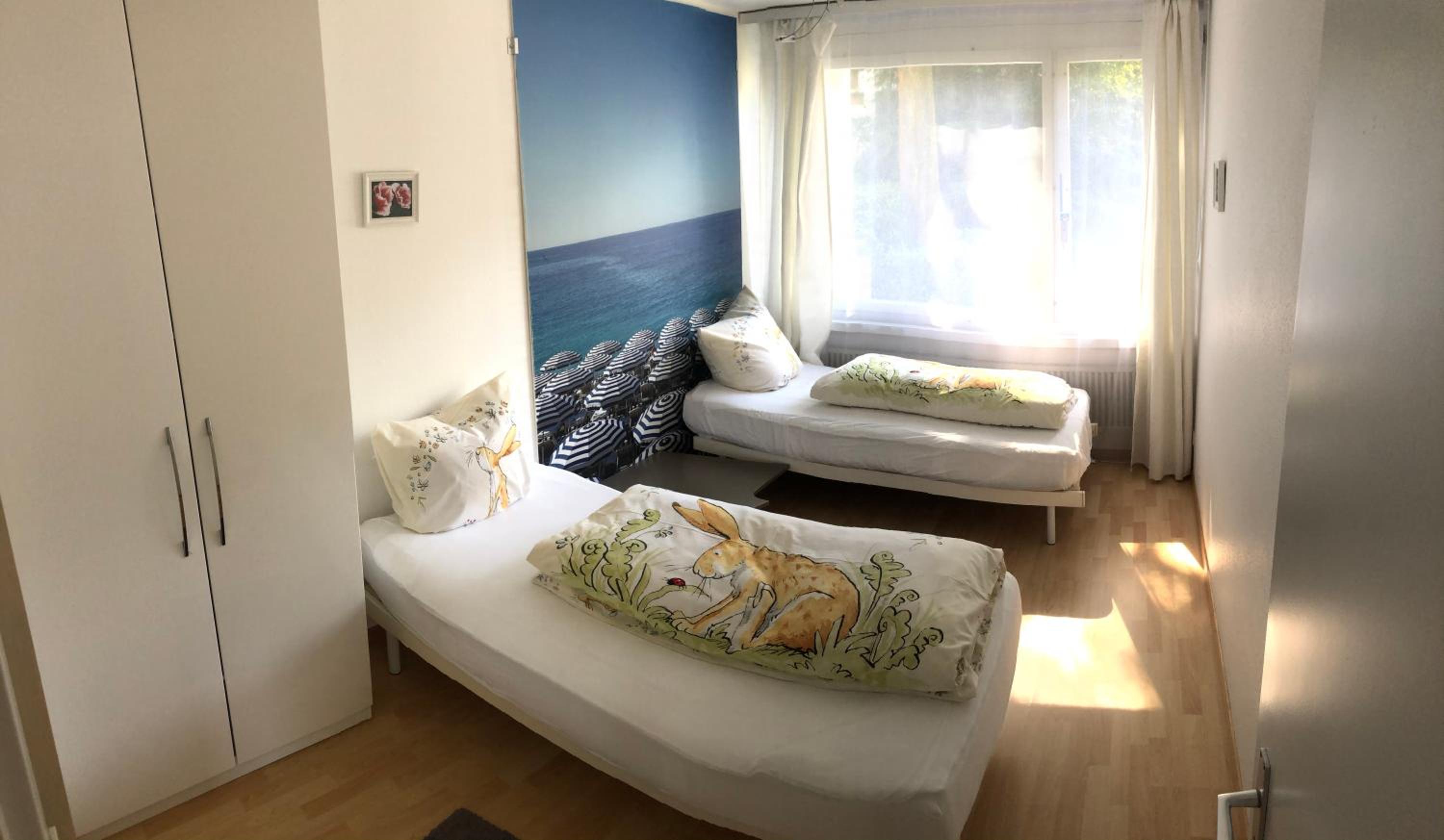 Three-Bedroom Apartment - Photo 24