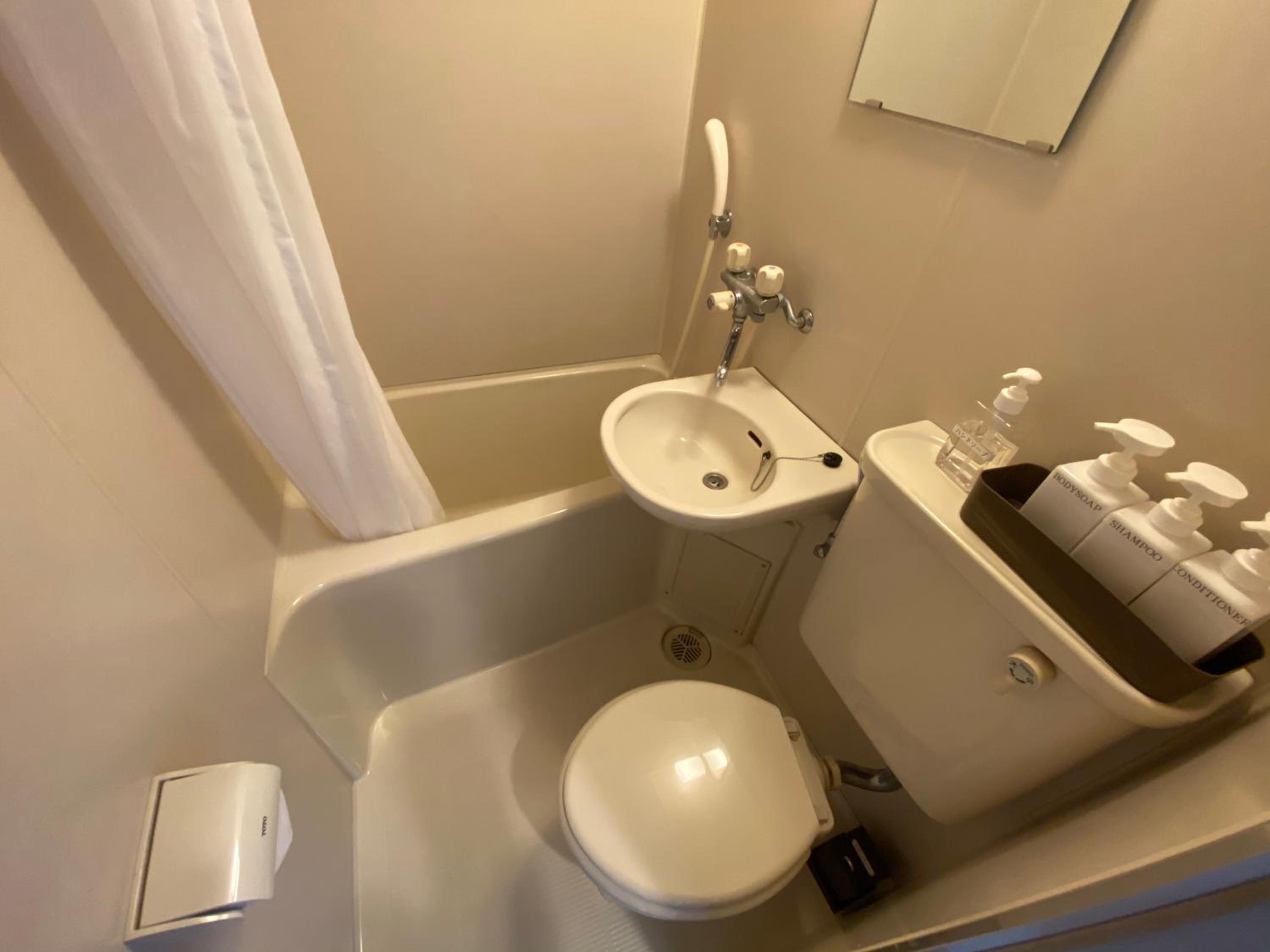 Standard Twin Room - Photo 7