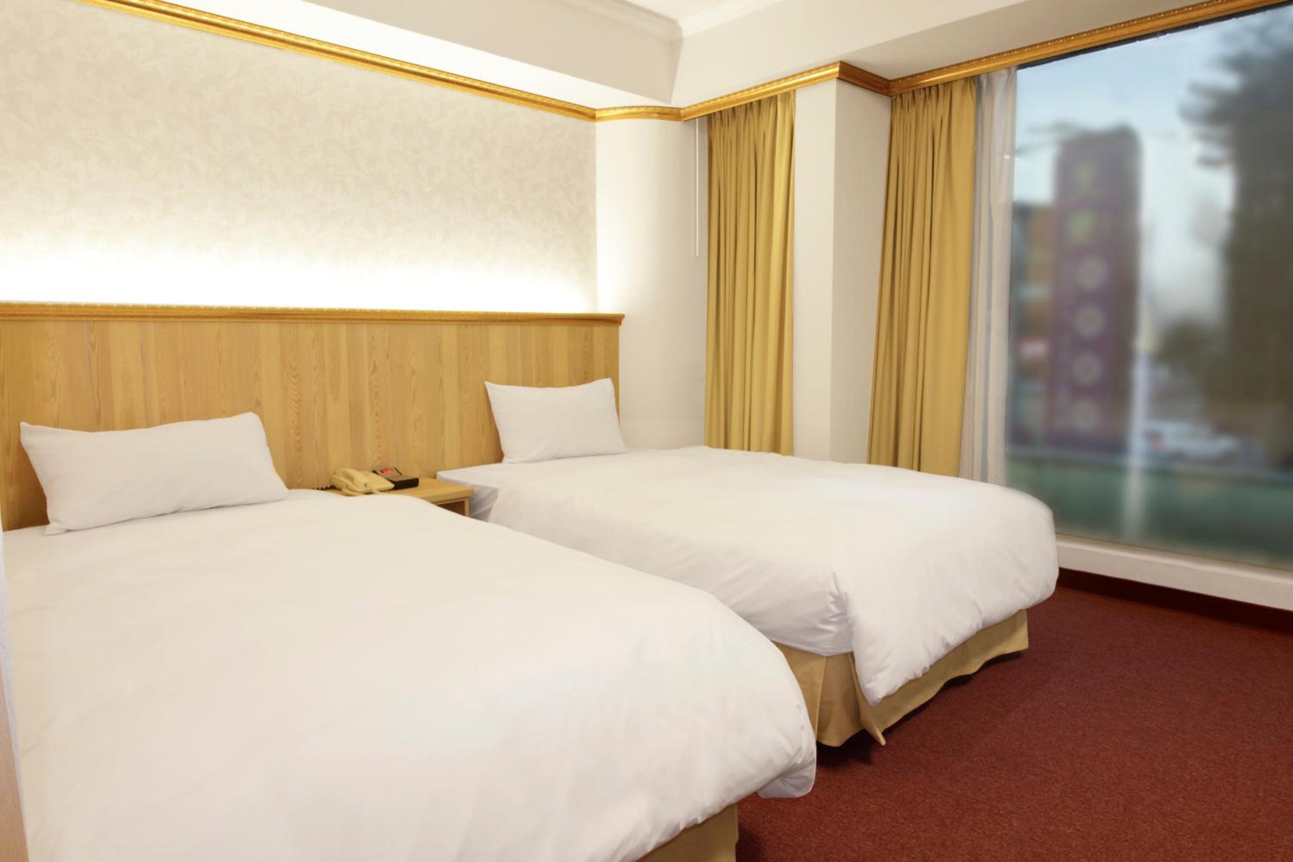 Standard Twin Room - Photo 4