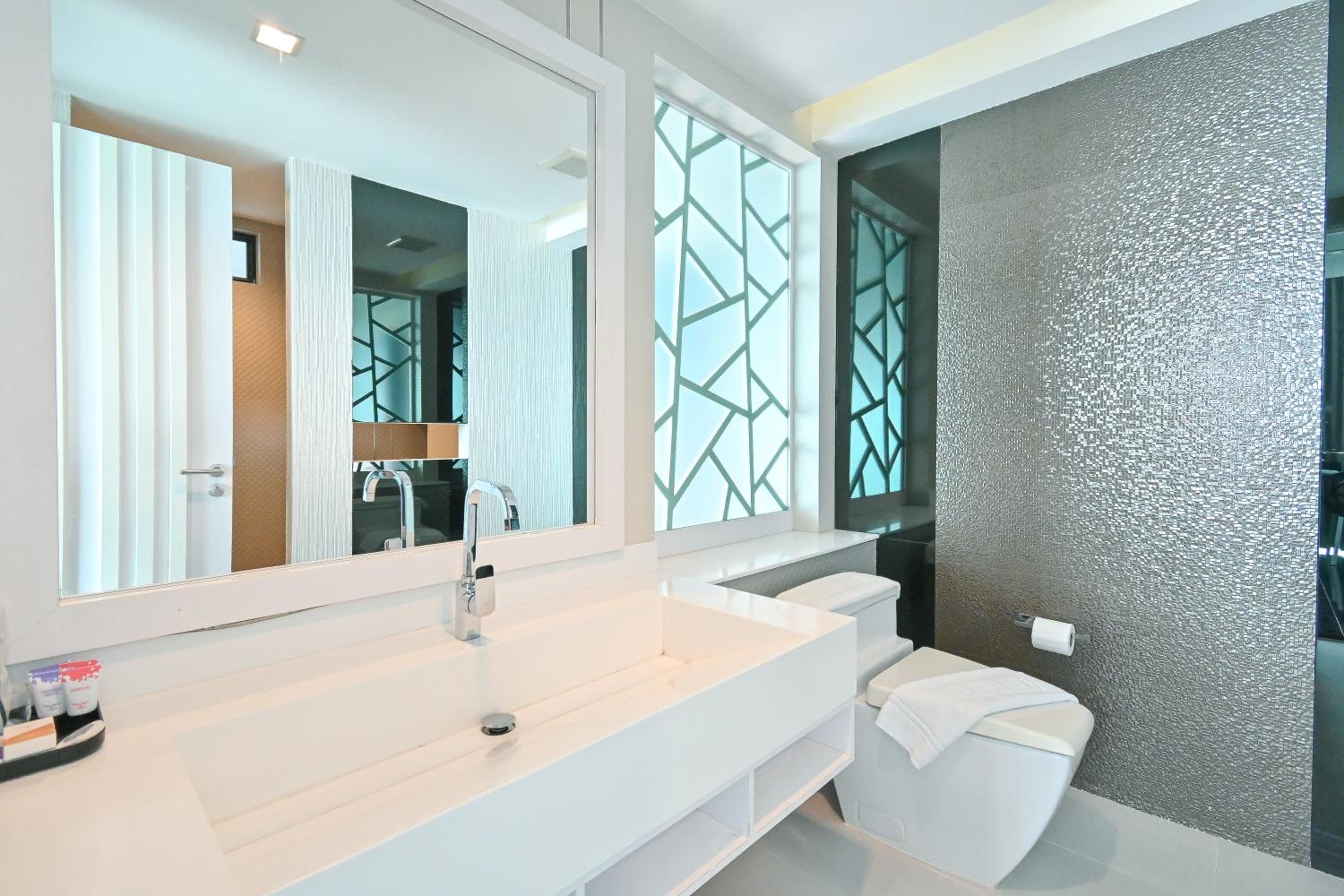 Deluxe Triple Room - Photo 12